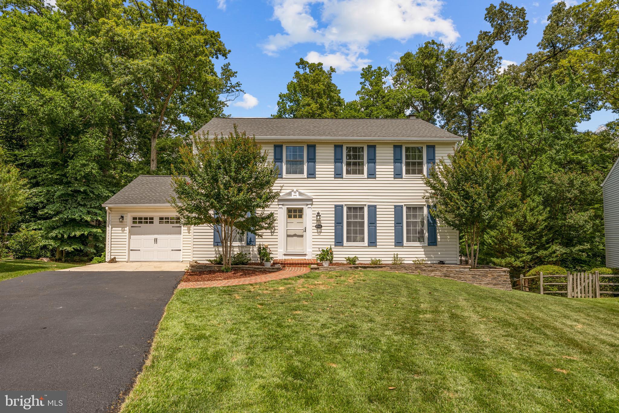 Welcome home to Newington Forest, where tree-lined streets and a peaceful setting set the stage for this beautifully updated colonial. Step through the front door and rich hardwood flooring leads you through a sun-filled living room into a dining room dressed in elegant board and batten trim, perfect for memorable gatherings. The chef-inspired kitchen is a true showstopper, featuring crisp white cabinetry, granite countertops, a statement copper farmhouse sink, tile backsplash, and stainless steel appliances. Beyond the kitchen, a generously sized family room centers around a charming brick fireplace, creating a cozy retreat for cool evenings. Upstairs, the hardwood flooring extends into a serene primary suite complete with a private bath finished in tile, while three additional bedrooms, and a second full bath finished in tile offer comfortable space for family or guests. Downstairs, the lower level unlocks even more possibilities with a versatile rec room and den, both finished with wood-grain flooring, ideal for a home theater, playroom, or home office, plus a dedicated storage room for keeping everything organized. Outside, a new composite deck stretches the length of the home, the perfect perch for morning coffee or evening entertaining, while the sprawling, tree-canopied backyard offers a private escape complete with an oversized shed and a charming wooden playground. Parking is effortless with a one-car garage plus driveway and street parking for guests. Life in Newington Forest means resort-style amenities right outside your door, from a sparkling community pool and tennis courts to tot lots, miles of scenic walking trails, and a lively community center. Just minutes to Saratoga Shopping Center, Springfield Town Center, Costco, and Fair Winds Brewing Company for effortless errands and weekend fun. Quick access to Fairfax County Parkway, I-95, and the Franconia-Springfield Metro and VRE puts the entire DC region within easy reach, and this address falls within the coveted South County school pyramid. Don't wait to fall in love - schedule your private tour of this Newington Forest treasure today.