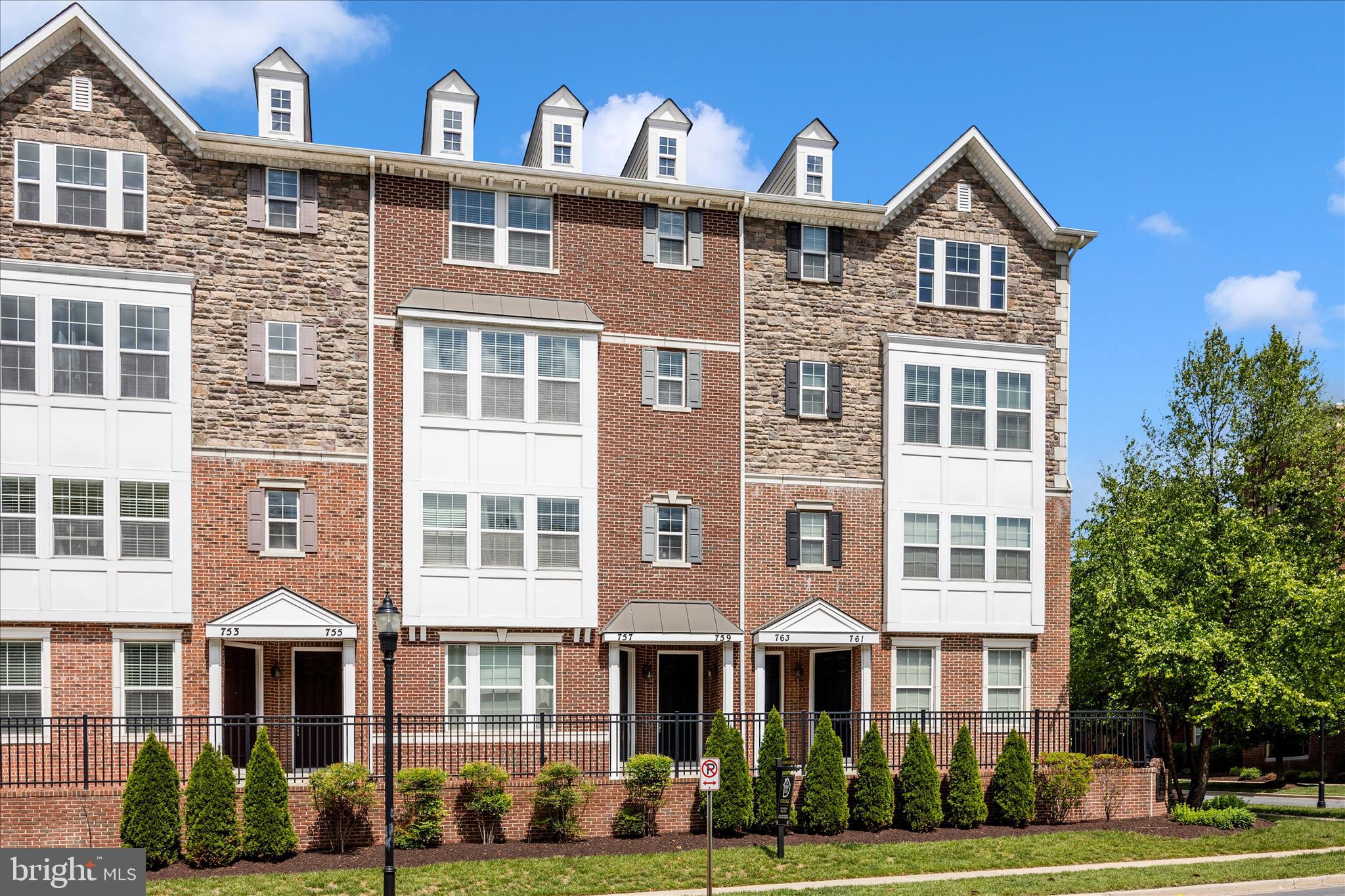 Enjoy a low-maintenance lifestyle with a condo fee that covers the essentials, including water, roof, siding, gutters, and other exterior maintenance. Spend less time worrying about upkeep and more time enjoying your home. Hardwood throughout townhome nestled in the sought-after Summit Reserve community! Offering over 2,800+ square feet, this spacious home features 3 bedrooms, 2.5 bathrooms, and a thoughtfully designed layout perfect for both everyday living and entertaining. Step inside to find a bright, freshly painted and open main level hardwood flooring throughout all levels with a gourmet kitchen, complete with granite countertops, stainless steel appliances, and generous cabinet space, flowing seamlessly into the living area for easy hosting. Upstairs, enjoy a large primary suite with dual closets, plus two additional spacious bedrooms and the convenience of bedroom-level laundry. A 1-car finished garage with epoxy flooring and ample storage complete this move-in-ready home. Located just minutes from shopping, dining, and major commuter routes, this home blends comfort, space, and convenience in one of Gaithersburg’s desirable communities.  Seller has completed pre-home inspection and will include with contract.