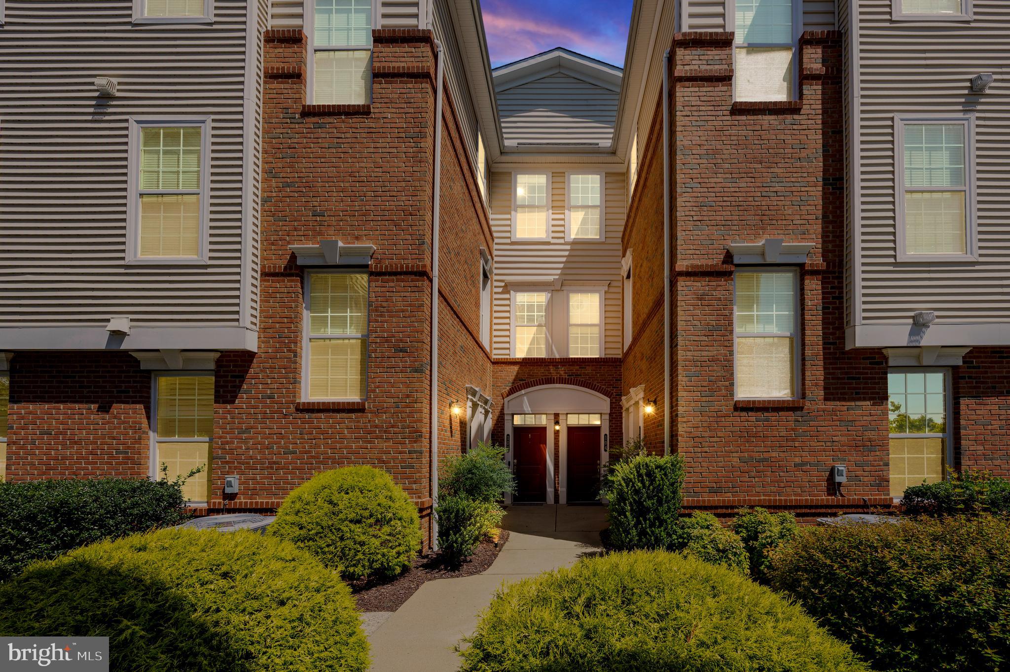 Welcome to Loudoun Valley Estates in the heart of Ashburn! This beautifully maintained three-level luxury condo features 2 bedrooms, 2.5 bathrooms, and a detached one-car garage and driveway.

The open-concept main level offers a spacious great room, dining area, and a gourmet kitchen with stainless steel appliances, gas cooking, a center island, granite countertops, soft-close white cabinetry, subway tile backsplash, and stylish pendant lighting. Relax on the private balcony and enjoy beautiful western sunset views.

Upstairs, the owner's suite includes a walk-in closet and a spa-like bath with dual granite vanities and a large shower. A private guest suite with a full bath and an upper-level flex space, perfect for a home office, complete the upper level.

Additional features  a full-size front-load washer and dryer in the upper level, extra garage storage and ample guest parking. Fios available, and the condominium is FHA and VA approved. 

Conveniently located near shopping, dining, major commuter routes, Metro Station, Dulles International Airport, parks, recreation, and top-rated schools, this home offers luxury, comfort, and an unbeatable Ashburn location.