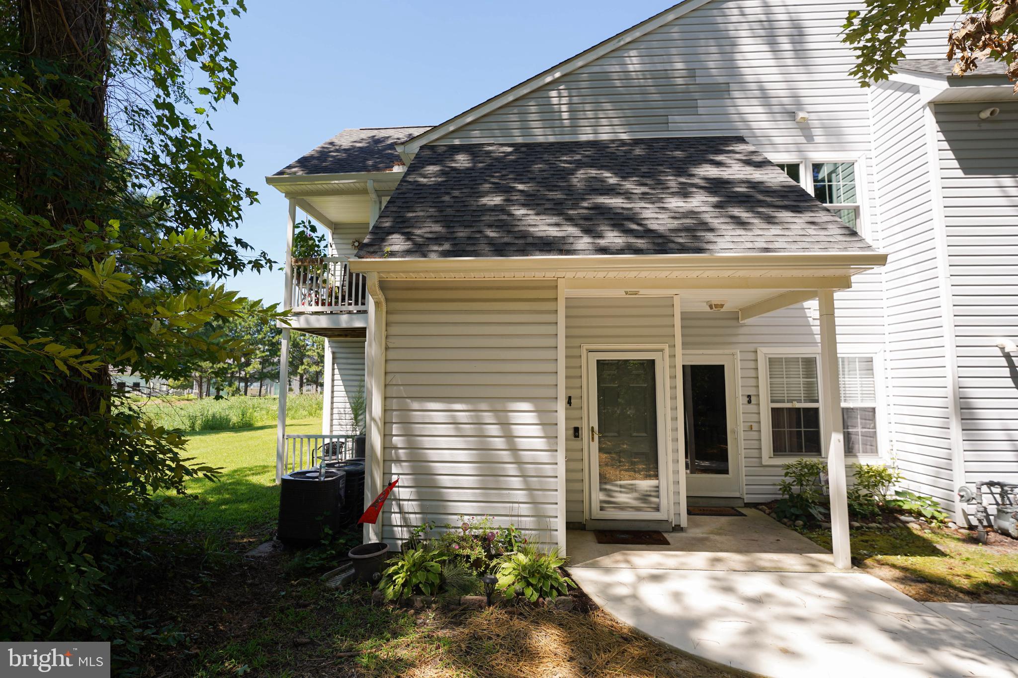 Welcome home to Unit 4 in the 11421 Building of the Meadows at Manklin, the epitome of low-maintenance living located just inside of the South Gate entrance of Ocean Pines. This bright and airy 3 bedroom 2 full bathroom condo unit is just waiting for it's new owners to come and introduce themselves! 

With a ground-level entry, you'll walk inside, and then upstairs to an open concept floorplan, an efficient kitchen adorned with stainless steel appliances, bright white cabinetry, granite countertops, and kitchen island with knee wall for additional seating, counter space, and additional cabinetry! While open-concept, updated modern light fixtures help govern use of space, with enough space for formal dining, a living room, and even a built-in pantry to boot! Also located off the main living space is balcony access, perfect for enjoying morning coffee or evening drinks, taking in the saltwater breeze! 

Off the living area, you'll find a small bedroom accented with mini-french doors, giving you the potential to extend your living space, or keep a bonus space off the living room. The possibilities are there, you just need to bring your imagination! Off the kitchen, you'll find a hallway leading to a full hall bathroom, an additional bedroom, and last and most certainly not least, a primary suite, adorned with a vaulted ceiling that helps offer that open feel, and an en-suite full bathroom, equipped with full-size stackable front-load LG Direct Drive Front Load washer/dryer combination. Just off the en-suite bathroom you'll find the primary bedroom walk-in closet, recently upgraded with a custom California-closet style organization outfitting. 

Located a stones throw from the South Gate entrance to Ocean Pines, this condo is minutes from all that Ocean City MD has to offer, and just moments from Delaware beaches and tax free shopping in Sussex County DE. You'll benefit from the amenity-rich Ocean Pines neighborhood, with endless things to do year round, while being less than 3 hours from major Metropolitan areas like Baltimore, Washington DC, Philadelphia, and Virginia Beach. Come call it home full time, or your home away from home! At least, until this can be home, full time! Call to schedule your private tour today!