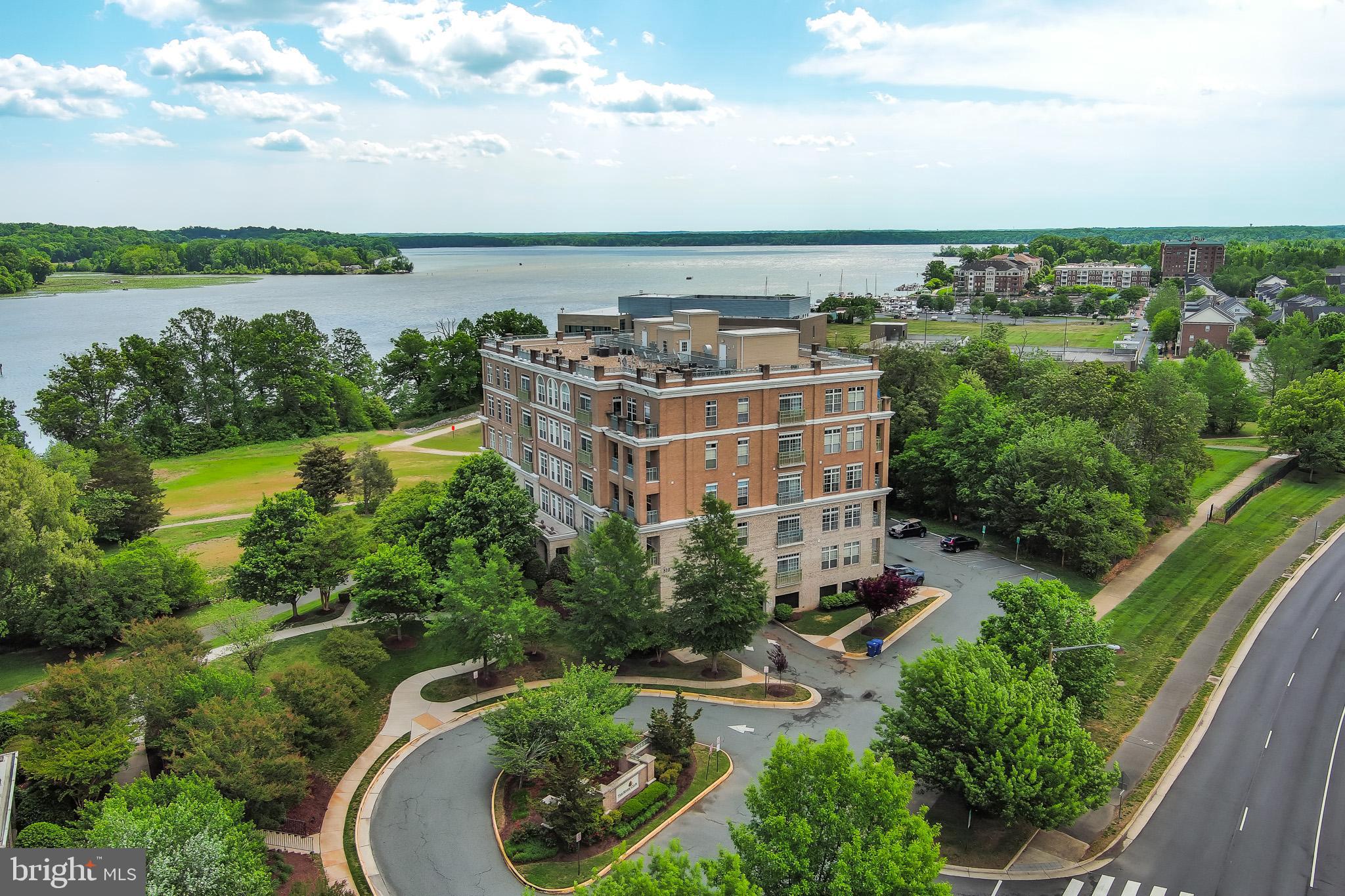 *** LARGE PRIVATE BALCONY *** River views, spacious living areas, and a walkable marina community. It’s a waterfront living at its finest.
This 2-bedroom, 2-bath condo offers a bright, open layout with large windows that pull in natural light and create an easy flow between the living, dining, and kitchen areas. The front living space and layout give you room to relax or set up a work-from-home spot.
The kitchen features ample cabinet storage, generous counter space, and stainless steel appliances.
Both bedrooms are spacious with large windows and great natural light. The primary suite includes its own private bath, while the second bedroom and full bath offer flexibility for guests or additional use.
Your large private balcony gives you peaceful views of the Occoquan River. You also have access to a rooftop terrace with a spectacular panoramic view overlooking Belmont Bay , plus waterfront walking paths and a nearby community marina.
Additional highlights include an HVAC system replaced in 2021.
Located in Belmont Bay, you’re just minutes to the Woodbridge VRE for commuting, with easy access to Route 1 and I-95. Close to the marina, Fort Belvoir, Quantico, Occoquan Bay National Wildlife Refuge, and the shops and restaurants in historic Occoquan.
Low-maintenance living with water views, outdoor space, and a connected location. Come see it in person and picture your lifestyle here.