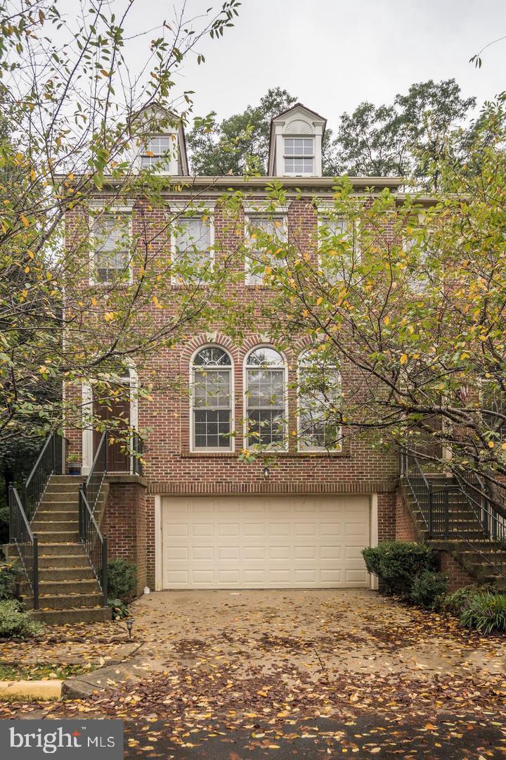 Beautiful brick-end townhouse backing to serene woods. It features an upgraded kitchen with stainless steel appliances, a gas range, custom oak cabinetry, and Corian countertops. The primary bathroom includes a separate shower and spa tub. The lower level offers a spacious rec room with a gas fireplace, built-in wet bar, wine cooler, and a separate laundry area. Enjoy a private fenced yard. Conveniently located just minutes from shopping, dining, and Metro bus access. So that you know, the hot tub is not available for use. Pets will be considered on a case-by-case basis. No Cats! Please don't lock the door from the basement to the garage.
Two-Hour Notice Required