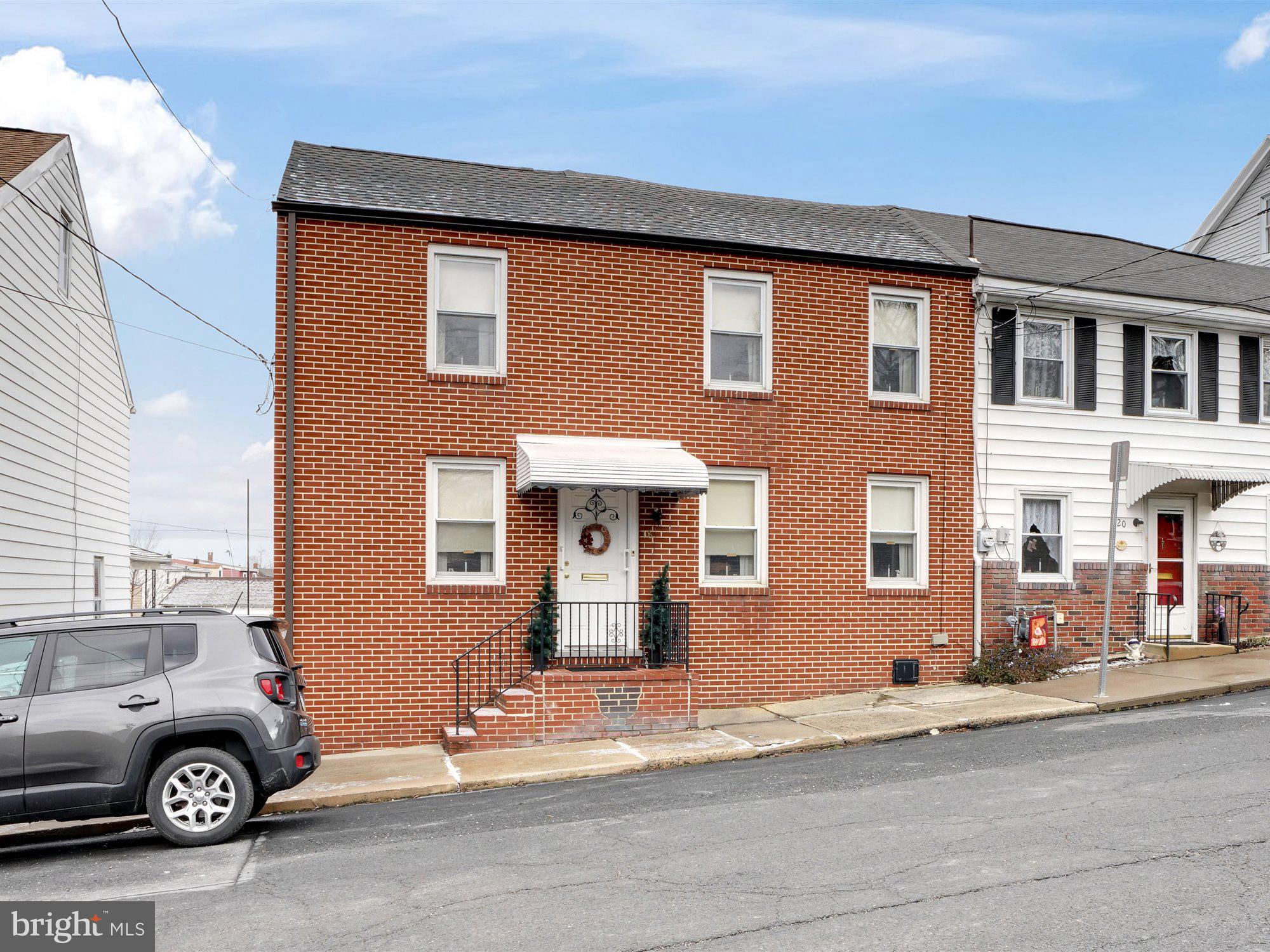 Well maintained 3BR/1BA attached brick-faced single in the Yorkville section of Pottsville is ready for a new owner.  Nicely sized at almost 1,400 square feet, this home will check off many of the amenities you are looking for, including a two car garage with overhead storage, large yard with  patio and outside fireplace, economical gas heat, new roof in 2018, and all replacement windows.  The first floor offers a wide open living/dining combination and adjacent eat-in kitchen. The second floor has the three bedrooms, all with at least one closet, and the full bath.  The attic space allows for any additional storage needs and the immaculately clean basement is home to the laundry as well as easy access to the rear yard.