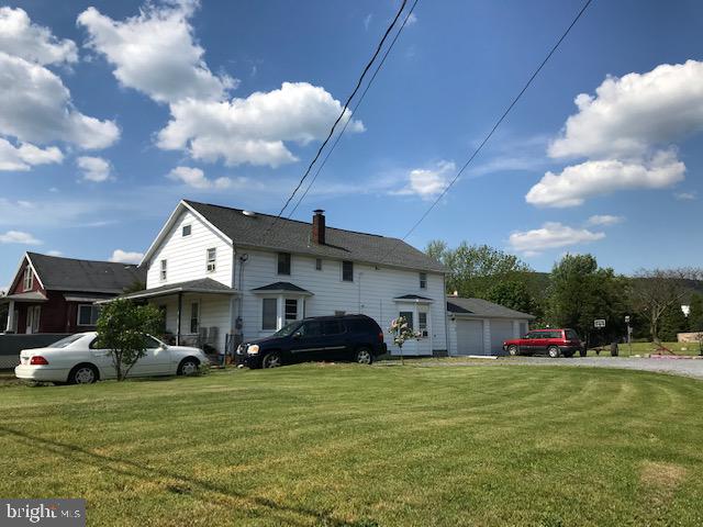 3 Unit includes:  2 Story Building with 2 units; Front unit offers an eat in kitchen, & living room on 1st floor, 3 bedrooms, 1 full bath & 1/2 bath on 2nd floor. attic and basement storage.  Tenant pay for Oil & Sewer; Back unit of 2 story offers an eat in kitchen, spacious Living Room, Full Bath & Laundry on 1st floor, large Bedroom & office on 2nd floor.  One garage bay included.  Tenant pays Oil & Sewer; 3rd unit is a detached one story home in rear of property that offers an updated Kitchen, Living Room, 3 Bedrooms, Laundry Room & updated full Bath.  One garage bay included.   Tenant pays oil & Electric.   All units share the well.