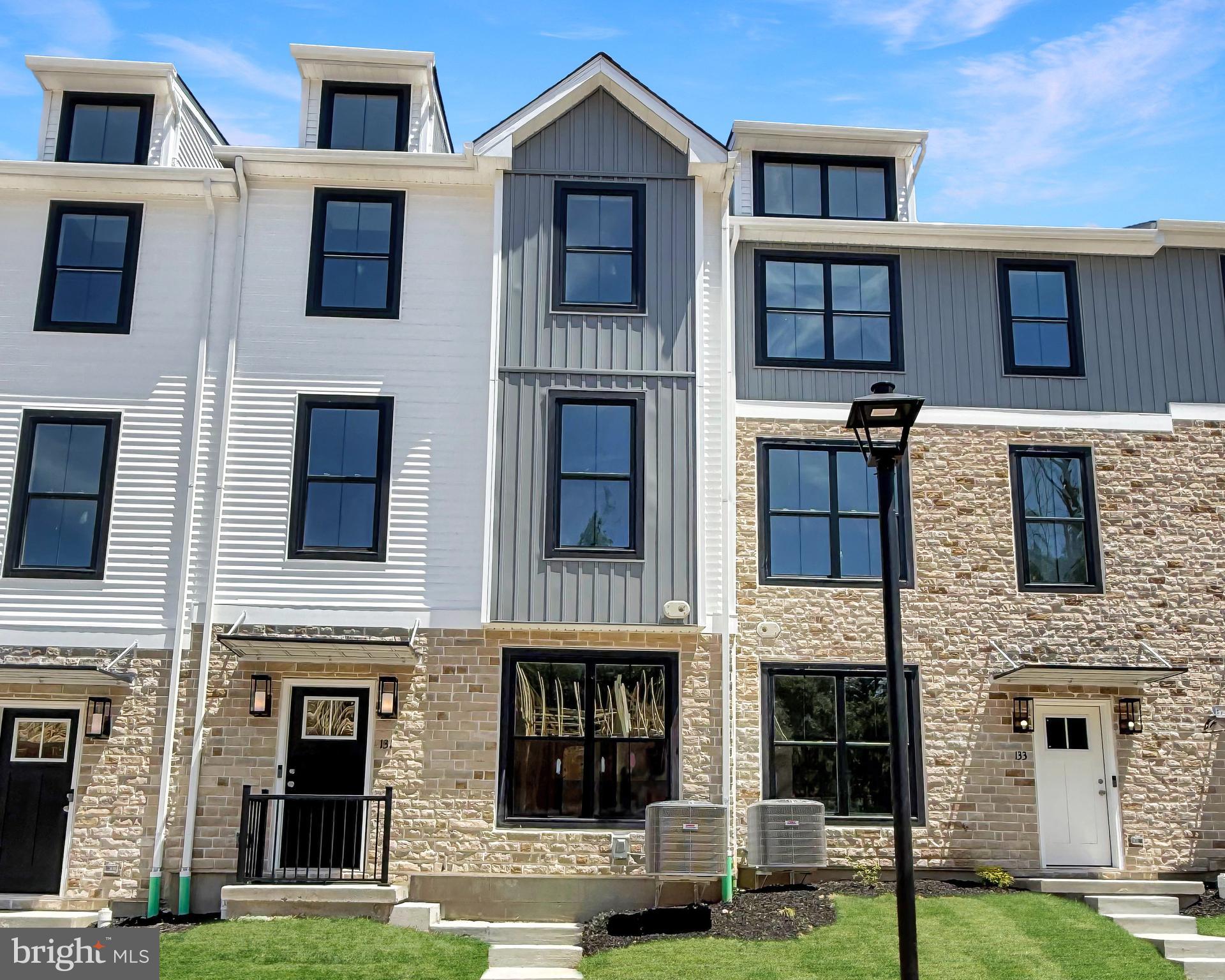 Welcome to the Pennington I at The Fields at Jacobs Way—now available as a quick delivery home with move-in by summer! This beautifully designed 3-bedroom, 2 full and 2 half bath townhome offers approximately 1,883 square feet of modern, low-maintenance living. The main level features an open-concept layout filled with natural light, highlighted by a charming bay window that adds both space and character. The kitchen is thoughtfully designed with extended counter space and an overhang for seating—perfect for casual dining—while flowing seamlessly into the dining and living areas for effortless entertaining. Upstairs, the owner’s suite provides a private retreat with an en-suite bath, while two additional bedrooms and a full hall bath offer versatility for family, guests, or a home office. The finished lower level includes a convenient half bath and flexible living space ideal for a rec room, gym, or workspace. Additional highlights include a 1-car garage, attractive exterior detailing, and a prime location close to major commuter routes, shopping, and dining. Don’t miss this opportunity for a quick move—secure your new home today and be settled in by summer at The Fields at Jacobs Way!