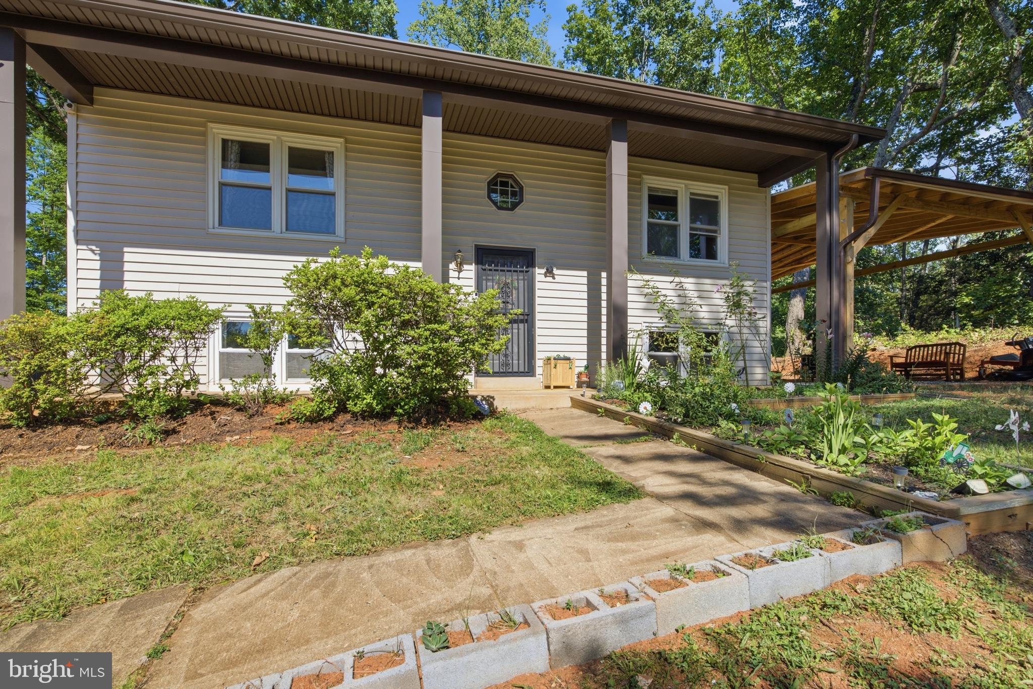 Enjoy the space and freedom you've been looking for with this move-in-ready home situated on 3 scenic acres. Whether you dream of gardening, adding a workshop, or simply enjoying the privacy, this property offers room to spread out while still being just minutes from schools, shopping, and everyday conveniences.
Inside, you'll find a recently renovated primary bathroom, fresh paint throughout, and a functional layout designed for comfortable living. The main level features three bedrooms, while the finished lower level adds a fourth bedroom, a half bath, and a spacious family room centered around a wood-burning stove, creating the perfect place to gather with family and friends.
Recent improvements include a brand-new water treatment system with UV filtration installed in 2025, providing added peace of mind and enhanced water quality.
Outside, the property truly shines with an extensive driveway offering abundant parking for multiple vehicles, RVs, trailers, work trucks, or other large equipment. The detached two-car garage provides even more space for parking, storage, or a workshop. With no HOA and plenty of room to enjoy both indoors and out, this well-maintained home is ready for its next owner to move in and make it their own.
Don't miss the opportunity to make this beautiful property yours. Schedule your private tour today because this convenient location won't stay on the market for long.