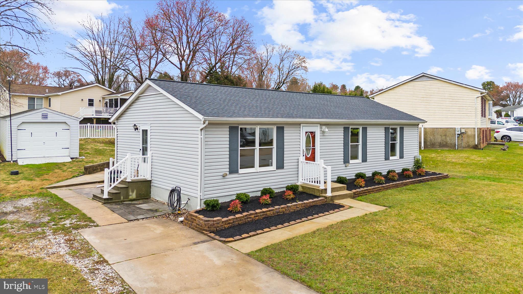 Reduced 15k. Motivated seller of this three-bedroom two-bathroom rancher with tasteful updates and more! This home has a full basement with room to grow. The spacious rear yard is complimented by a covered patio perfect for entertaining, and a detached garage. Single level living at its finest! Conveniently located near shopping, dining, and all major routes! Full unfinished basement with waterproofing already done. plenty of space for additional rooms and a walk out. Don't miss your opportunity to grow into your new home.