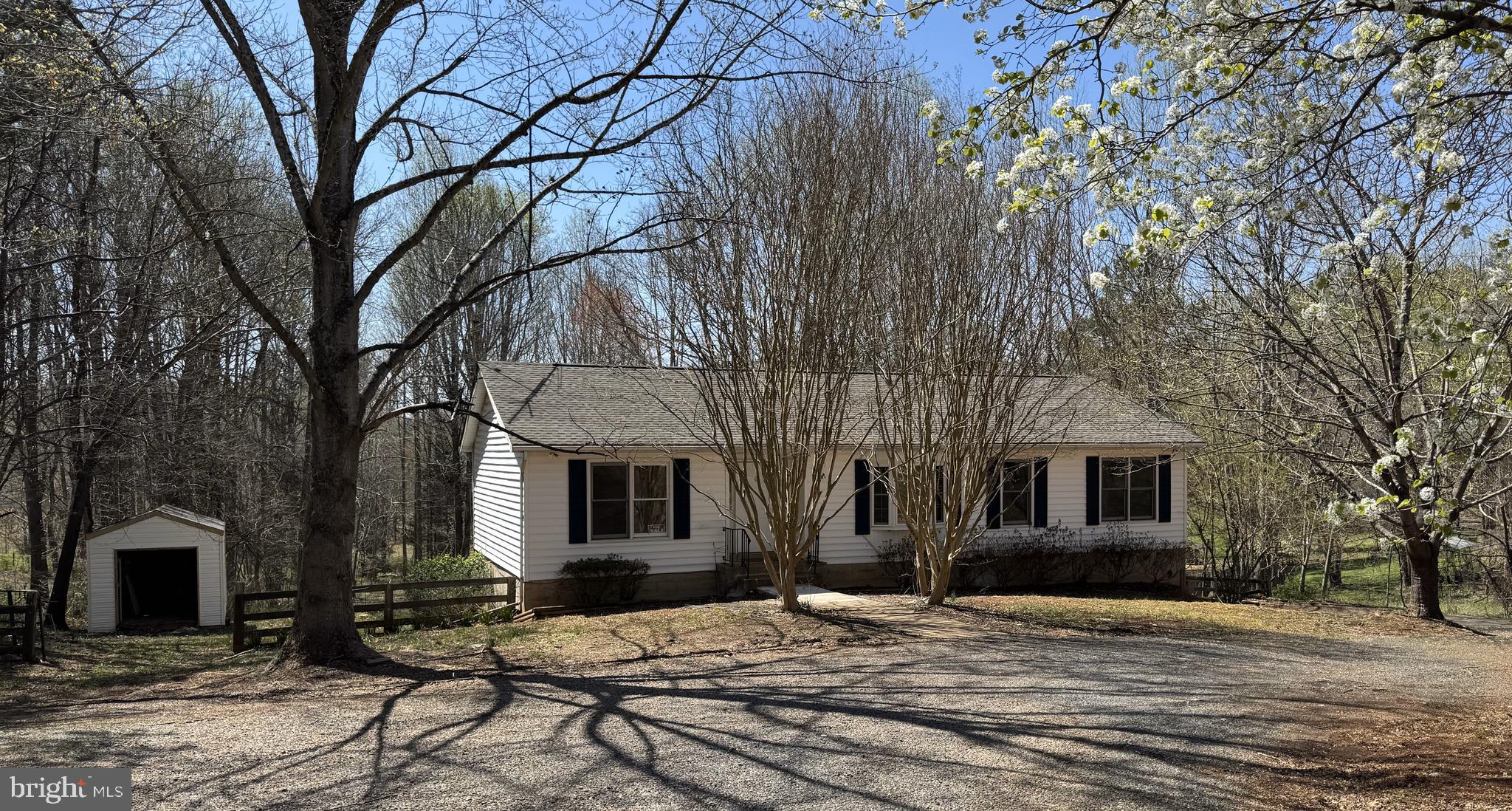 Cozy rambler with updates situated on a treed two acre lot with easy access to Warrenton or Culpeper. Home features   3 bedrooms and 2 full baths on the main level.  Living room has wood floors, gas fireplace,  built in  book shelves and cabinet with doors to the deck.  Kitchen has new cabinets and newer appliances and an island.  There is a paritally finished basement with family room, office/den previously used as a bedroom. Also in the basement is a 2 car garage, half bath and patio off the family room.  The property is being "sold as"  but no known defects.