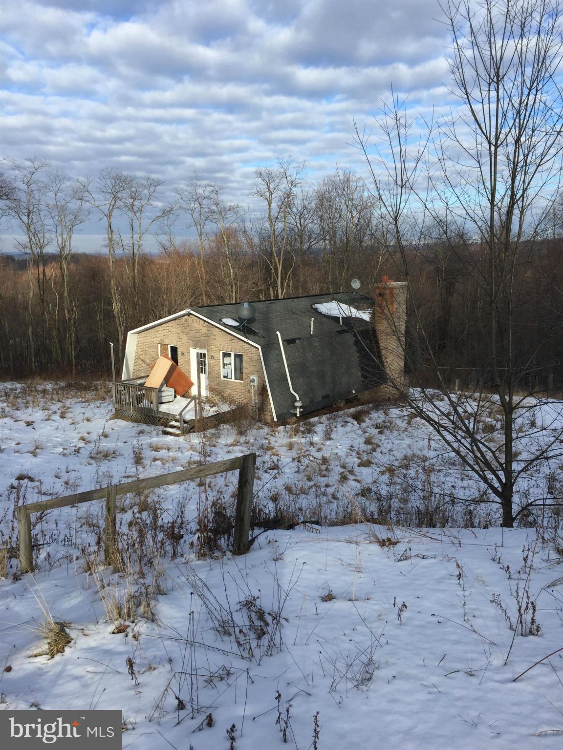 Bank Owned Foreclosure!  Needs a lot of work but priced to sell! Acreage is estimated +/-.