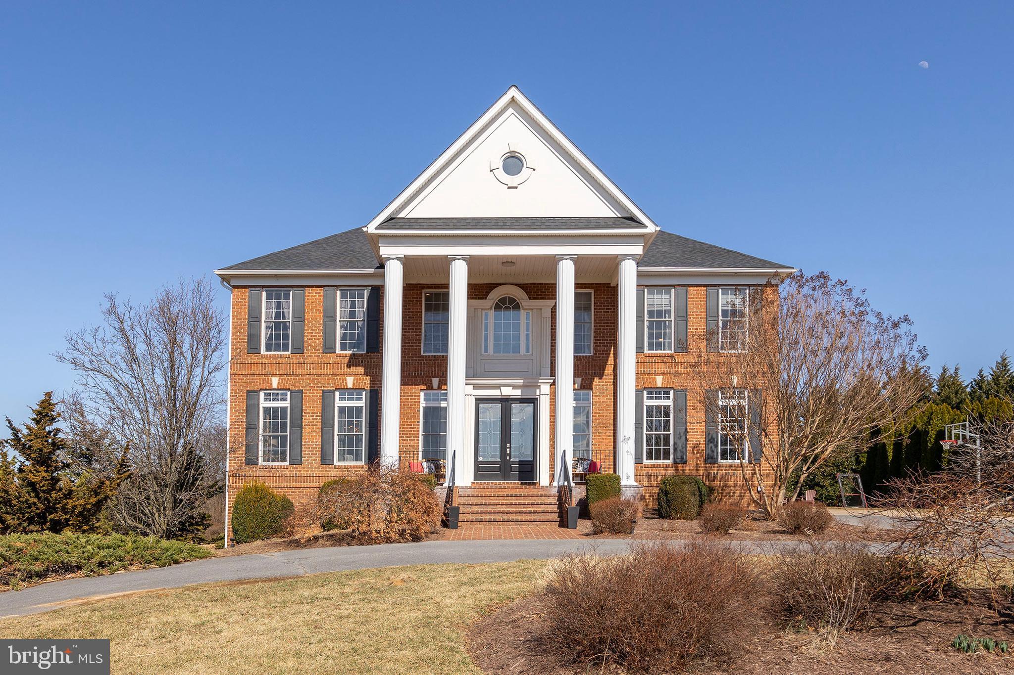 This beautiful home boasts an ideal floor plan with spacious rooms and luxurious finishes. The main level features large rooms with 10' ceilings, including a two-story family room with a stunning fireplace. The gourmet kitchen is a chef's dream, with granite countertops updated backsplash, a large island, and upgraded Sub-Zero appliances, perfect for preparing meals and entertaining. Enjoy casual dining in the breakfast room or step out onto the brick patio, accessible from both the kitchen and breakfast area.
The upper level offers a sophisticated library, while the lower level includes a rec room with a cozy fireplace and a full bath – ideal for hosting family gatherings and so much more. The ultimate master suite provides a serene escape, featuring a luxurious en-suite bath and a sitting area equipped with a fireplace. Other highlights include a 6 month old roof, new LED light fixtures, 40x30 garden with raised beds, a redone powder room on the main level, custom blinds throughout, media room, built-in bookcases in the library, and a well-appointed floor plan designed for comfort and style. Don't miss the opportunity to own this exceptional home!