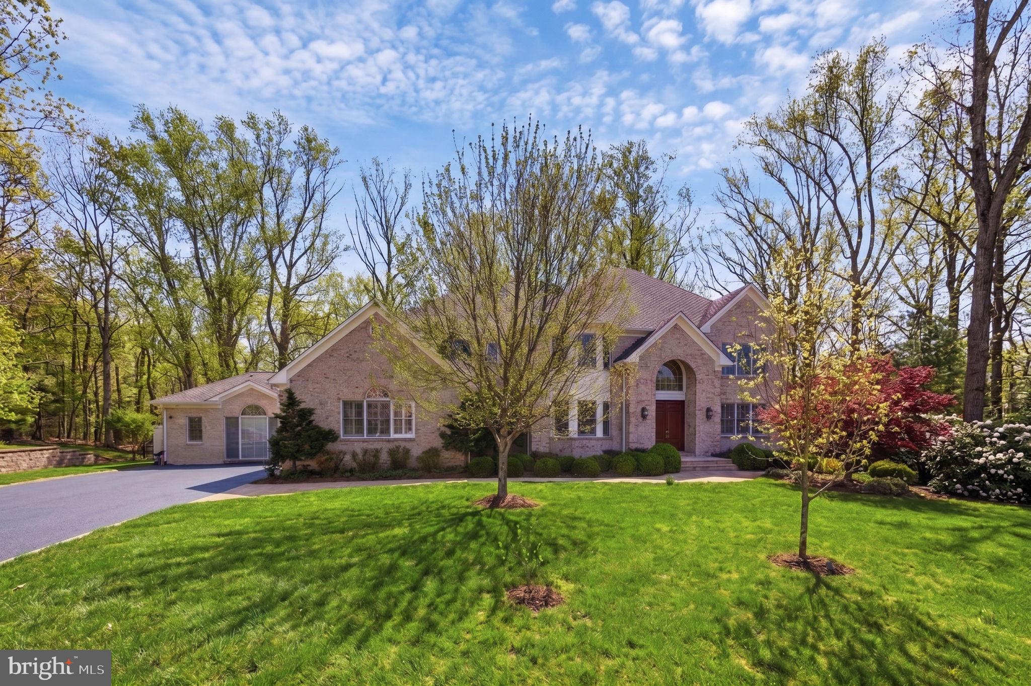 A rare opportunity to own a thoughtfully designed multigenerational estate that would be nearly impossible to recreate!
Welcome to an extraordinary luxury estate in the heart of Vienna, offering a truly rare opportunity to own a thoughtfully designed multigenerational residence that would be nearly impossible to recreate today. Privately sited at the end of a quiet cul de sac in prestigious Mill Race Estates, this exceptional property blends timeless elegance, modern luxury, and unmatched flexibility on a breathtaking, park like lot surrounded by mature trees and natural beauty.

Designed to accommodate today’s evolving lifestyle needs, the home features a remarkable connected yet private two level multigenerational suite with its own entrance, spacious living areas, full kitchen, bedrooms, baths, and gathering spaces, creating the ideal setup for extended family, au pair living, long term guests, or luxury private accommodations without sacrificing connection or privacy.

The main residence offers beautifully updated living spaces filled with natural light, soaring ceilings, elegant hardwood floors, and seamless indoor outdoor flow. The remodeled chef’s kitchen features premium appliances, custom updates, generous entertaining space, and opens to inviting family and dining areas designed for both everyday living and large scale entertaining.

Extensive improvements and thoughtful enhancements throughout the home include updated HVAC systems, remodeled baths, designer lighting, custom window treatments, Sonos audio, Lutron lighting, heated bathroom floors, multiple laundry hookups, and exceptional smart home functionality. Outdoor spaces are equally impressive, with mature landscaping, flowering trees, wooded trail access, multiple entertaining areas, and a private setting rarely found this close to Tysons, Reston, and Washington, DC.

Offering a combination of location, land, privacy, scale, and true multigenerational functionality that is increasingly difficult to build or duplicate in today’s market, this is more than a home, it is a legacy property designed for the way people want to live now.