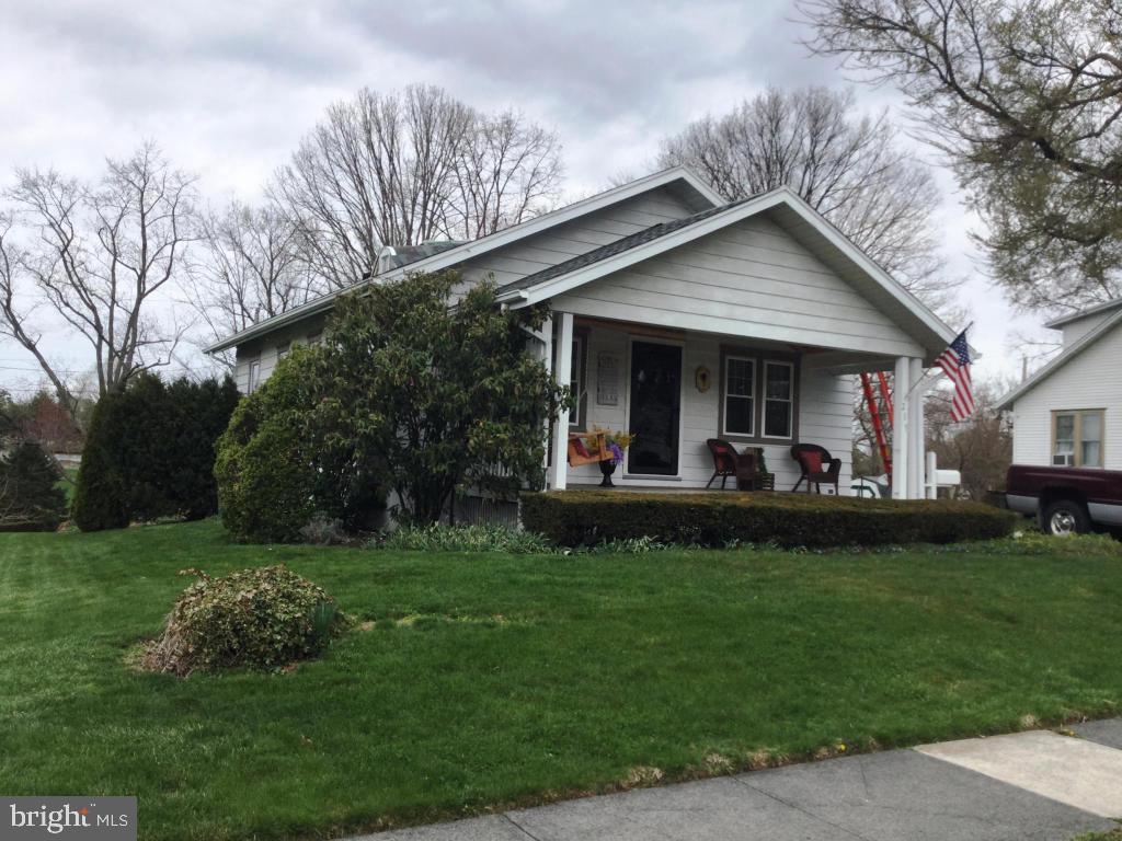 Cute as a button vintage bungalow w-large front porch(wood ceiling)original wood work, stained doors, built-ins, interior french doors, glass door knobs and more. Great yard too! New roof & newer C/A & 1 yr. warranty for peace of mind.