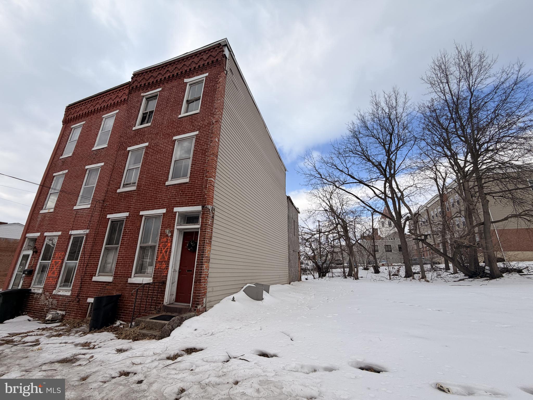 Investor Package Opportunity: 428 Kelker Street (with Adjoined 426 Kelker Street & Adjacent Corner Lot at 424 Kelker Street), Harrisburg, PA 17102

Attention investors and rehabbers! This semi-detached brick twin home (sharing one common wall with 426 Kelker St) in vibrant Midtown Harrisburg presents significant value-add potential for experienced buyers. Built in 1900 with approximately 1,878 sq ft of living space (per public records; some sources note variations around 1,702–2,230 sq ft) on a compact  1,123 sq ft lot, the property at 428 Kelker St is currently condemned and placarded by the Harrisburg Bureau of Fire for demolition due to structural concerns and safety issues. It is offered strictly as-is and requires substantial rehabilitation to bring it up to code.

The interior is cluttered with personal belongings and debris, making navigation challenging—buyers should exercise extreme caution during any showings, and access may be limited. Estimated repairs could total around $100,000 (or more, depending on scope and contractor bids, similar to the adjoined property). With the right plan, this could transform into a desirable rental or resale, with comparable renovated homes in the area suggesting an after-repair value (ARV) of approximately $190,000 to $200,000.

Seller prefers to sell as a package including the subject property at 428 Kelker St (listed at $24,900), the adjoined property at 426 Kelker St (listed at $44,900), and the adjacent corner lot at 424 Kelker St (listed at $9,900), for a combined total of $79,700. This creates an attractive opportunity for investors to acquire a larger contiguous footprint—potentially for side-by-side rehabs, expanded development, added parking/yard value, or multi-unit potential—subject to city approvals and zoning.

Prospective buyers are strongly encouraged to consult directly with the City of Harrisburg Codes Bureau regarding any potential for rehabilitation, condemnation removal, or demolition avoidance. A structural engineer's report or detailed rehab plan may be required. No representations are made about the city's approval process, timelines, or feasibility—due diligence is essential, including verification of all listings, parcel details, and current status.

Priced aggressively for a quick sale. Cash or hard money financing recommended; conventional loans unlikely due to condition. Contact listing agent for details on safely accessing the properties or discussing the package. All information provided is deemed reliable but not guaranteed—verify independently. Sold as-is, where-is, with no warranties expressed or implied.