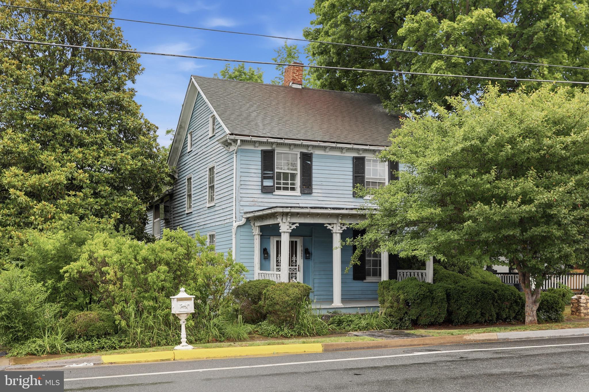 An exceptional opportunity to restore and reimagine a historic Main Street property in the heart of Middletown. Prominently located along one of the towns most recognized corridors, this four bedroom, two bath home offers timeless character, outstanding potential, and a location that is difficult to duplicate. Believed to date to the early 1800s, the home has been part of Middletown history for generations and is ready for its next chapter. Just a short walk to local shops, restaurants, cafes, and community gathering spaces, this property offers the charm and convenience of small town living.  Situated on a generous in town parcel with desirable B1 zoning, the property provides exceptional flexibility for residential living, professional office, business use, or a mixed use concept subject to local approvals. The additional side land offers potential subdivision opportunities subject to application and approval. Rear alley access further enhances the versatility of this unique property while the prominent Main Street location provides outstanding visibility for a variety of future uses.  Inside, the home features four bedrooms, two full baths, and the character expected of a historic residence. The property is ready for restoration and thoughtful updating, presenting an exceptional opportunity to preserve its historic charm while incorporating modern improvements. Whether your vision is a distinctive residence, professional office, investment property, or live and work opportunity, the possibilities are substantial.  Historic Main Street properties offering this combination of character, location, flexible B1 zoning, additional land, rear alley access, and future potential rarely become available. Property is being sold as is.