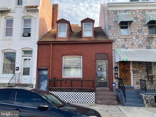Cozy Two-Story Home with Old World Charm. Original Hardwood Floors in Living Room. Two Bedrooms and One Full Bath.  Gas Hot Air Heat, Gas Hot water Heater, Cast Iron Tub, Gas Stove and Refrigerator, Back Porch, Spacious Fenced Back Yard with Shed. This Property Has PRIVATE PARKING FROM ALLEY ACCESS!