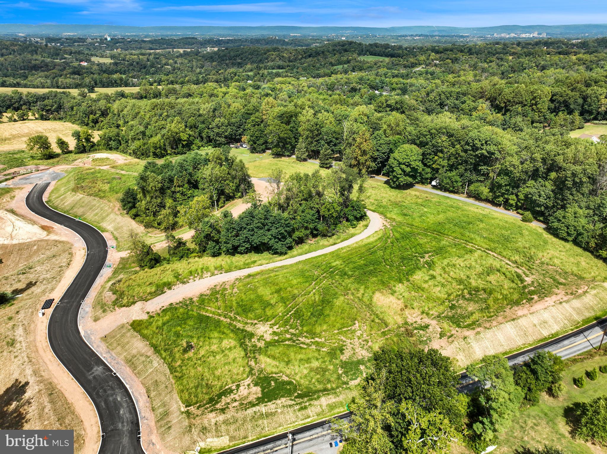 Phase III Now Open!! Oak Hill features a picturesque setting with spacious homesites and the ability to build a true high quality custom home.  The Lots in Phase III  range in size from 1.23 acres to 3.25 acres with mountain views, privacy to the rear, mature trees and an opportunity for exposed walkout basements plus side-entry garages. Tucked away but less than 20 minutes from UPMC and PSU Medical Centers  and minutes away from Liberty Forge Golf Course, Lower Allen Park, Roof Park, Ski Roundtop, Gifford Pinchot State Park and the scenic Yellow Breeches Creek . Oak Hill's location also allows for easy access to  I-83, PA Turnpike and Route 15. Minimum square footage (1500 ranch/1800 two-story) and architectural restrictions apply. Exclusive builders are JW  Mumper,  Haven Homes and Renovations,  Musser Home Builders, and Hutch Homes, Inc .    There are still a 1.5+ acre Lot  available in Phase I and 1 lot available in Phase II.  Additional community information can be found by clicking the BRIGHT- Documents icon. To assist with locating,  put 400 Willow Oak Dr Lewisberry into your GPS