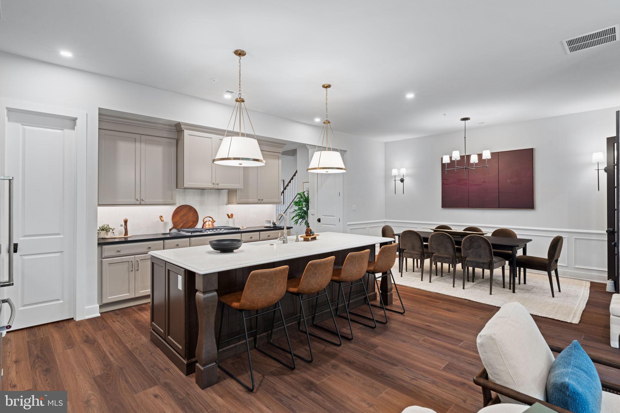 Experience luxury, low-maintenance living in this stunning Harper Grand carriage home at River Trail at Valley Forge with direct access to the Schuylkill River Trail leading to Valley Forge National Historical Park and just minutes from King of Prussia Town Center shopping and dining.  This move-in ready home features a Finished Walkout Basement, Chef’s Kitchen with built-in appliances, walk-in pantry, and an open-concept layout filled with natural light. The main level impresses with 10’ ceilings, 8’ doors, oversized great room windows, and a dining area that opens to an elevated composite deck for easy indoor-outdoor living.  Upstairs, the private primary suite offers two walk-in closets, and a spa-inspired bath with dual quartz vanities and walk-in shower. Two additional bedrooms, a full bath, and laundry room complete the upper level.  Enjoy outdoor adventure and convenience in one of King of Prussia’s most exciting new communities. Summer 2026 move-in. Photos are representative of the Harper Grand Model Home, now open for touring!