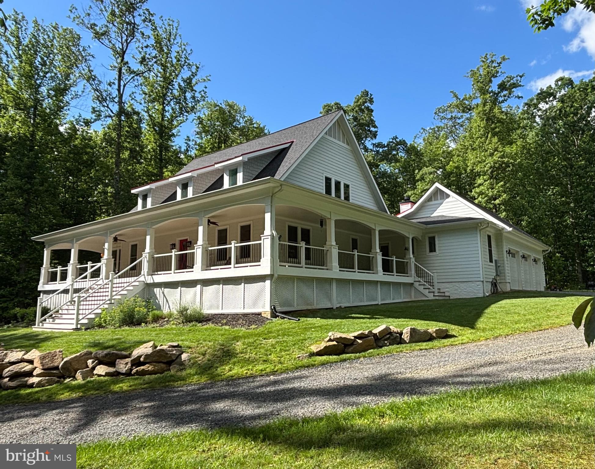 Want privacy? You've got it! Surrounded by nature? You've got it! Top of the line finishes? 5 Bedroom 3.5 baths? It's all here at "Black Bear Meadow" in this Custom-Built Cape Cod with deep wrap around porches on almost 19 acres, R-1, with 5440 Sq Ft finished! Work from home in the private office with redundant options for WIFI. Large main level owner’s suite has steam shower, a sunroom/sitting room with access to the outdoor patio and unique attached nursery/second bedroom area. REAL solid oak hardwood 6” flooring. This Seller spared no expense in finishing this home, note the impressive Adam’s trim on all three floors. The Gourmet Kitchen features a walk-in butler’s pantry and opens to the living room plus the floor to ceiling, stone, wood-burning fireplace and built-in library shelving. There is a matching outdoor patio fireplace for quiet evenings watching fireflies float up into the treetops. There's a mudroom & laundry on the main level with more built-in cubbies. The lower level, just finished in June, has full size 5th bedroom, full exercise room with TV, padded flooring, and has a level walk out to second patio. Off the main game room there is a media room with double thick walls and additional sound insulation...Sound studio waiting on your musical inspirations. Lower-level Family Room includes an antique bar that awaits final connection to water in wall. There are hiking & riding trails throughout the property. And a clear garden area. Come, sit on the porch for a while, listen to the serenade of birds. Recenter every day. You will fall in love!