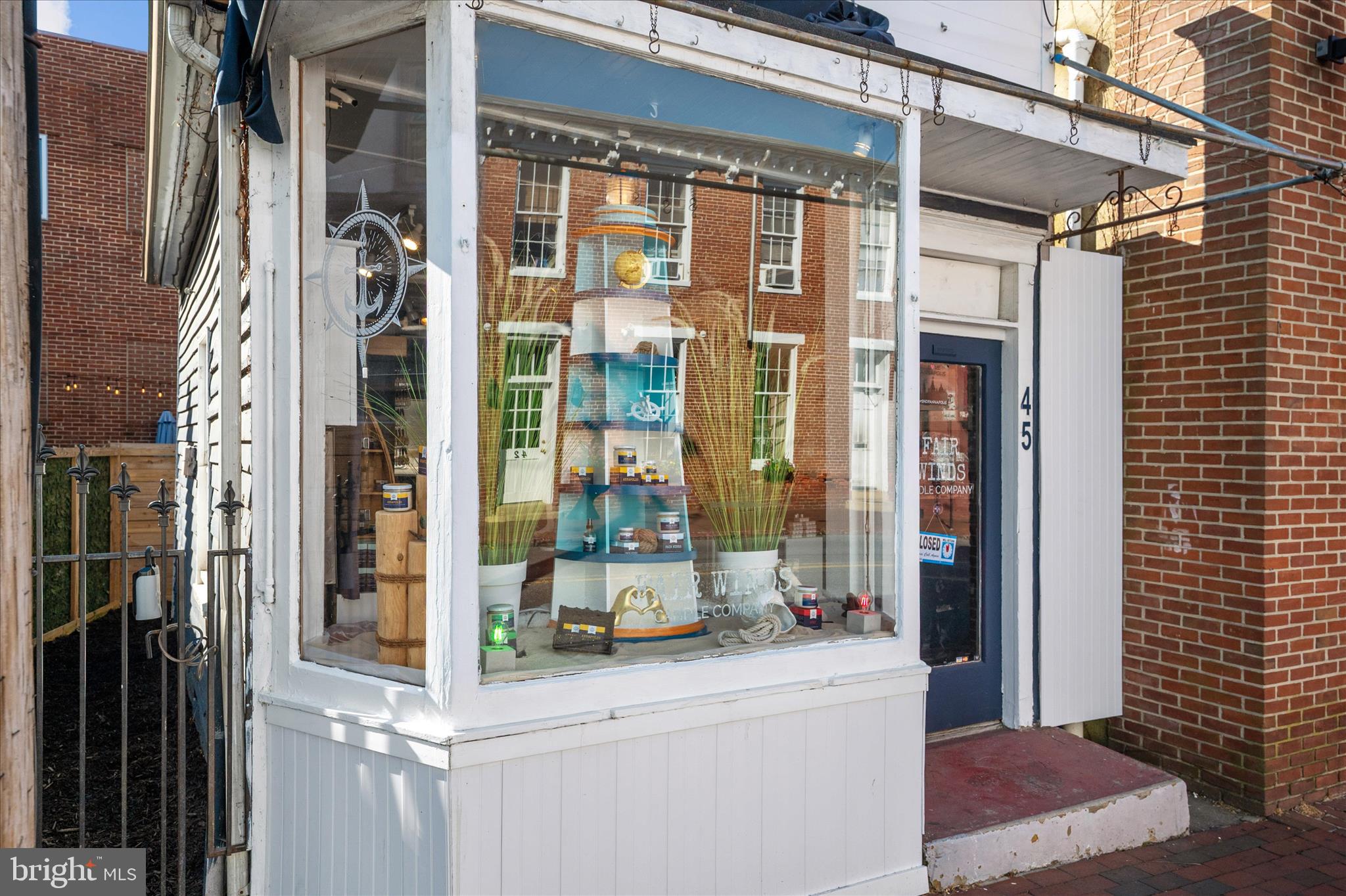 45 Randall Street is the kind of opportunity that almost never comes available in Downtown Annapolis—a charming boutique storefront positioned directly in the heartbeat of one of Maryland’s most visited waterfront destinations. Perfectly situated between the U.S. Naval Academy and the Annapolis waterfront, this high-visibility commercial property captures constant pedestrian traffic from tourists, locals, midshipmen, and boaters alike. The building’s prominent street presence and classic downtown character create the ideal setting for a boutique retail concept, coffee bar, specialty shop, studio, or investment hold in an irreplaceable location. Surrounded by established national and local retailers, restaurants, and year-round activity, this property offers the rare chance to own a piece of Randall Street in the center of Annapolis’ thriving historic district. Seller financing may be available.