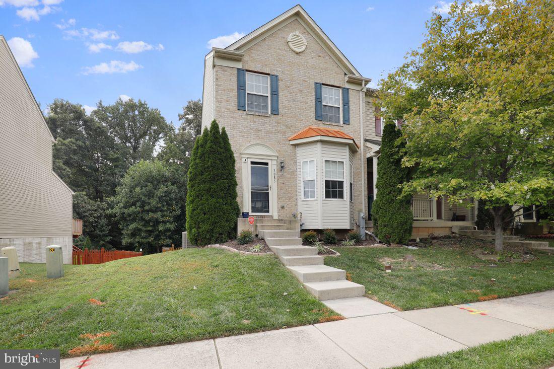 You will not want to miss this beautiful, end-of-group, brick-front townhome with a bump out! As you step into this captivating charmer, you feel like you are right at home! The first floor with stunning recently replaced laminate floors contains a spacious open living room that leads into the large kitchen/dining area and renovated powder room! Ignite your culinary creations in this functional kitchen space with gleaming recently updated professional stainless steel appliances, a large pantry, center island, breakfast bar, and newly updated granite countertops to entertain or host a large family sit-down dinner. The kitchen offers lots of natural light with sliders that lead to a large recently refinished deck overlooking your fully fenced, oversized private backyard, that backs up to the woods. Upstairs has three oversized bedrooms with two full baths. The finished basement level has a great entertainment space and fitness area with a walkout to the backyard! This Corner lot maximizes your outdoor living space and the privacy fence makes this yard feel like your own outdoor oasis.

HVAC was updated in 2018 with a high-efficiency unit.