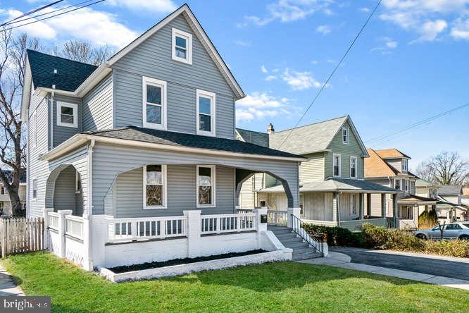 Renovated traditional home w/ wraparound porch and 2,300 sq. ft. of interior finished space including basement and attic make this home unique! (SDAT records incorrect.) Modern kitchen w/ stainless appliances, recessed lighting, gleaming hardwoods and custom woodwork throughout! Level backyard w/large patio perfect for entertaining! This 4 BR 2BA 2HB home is a must see! Renovation permitted and inspected.