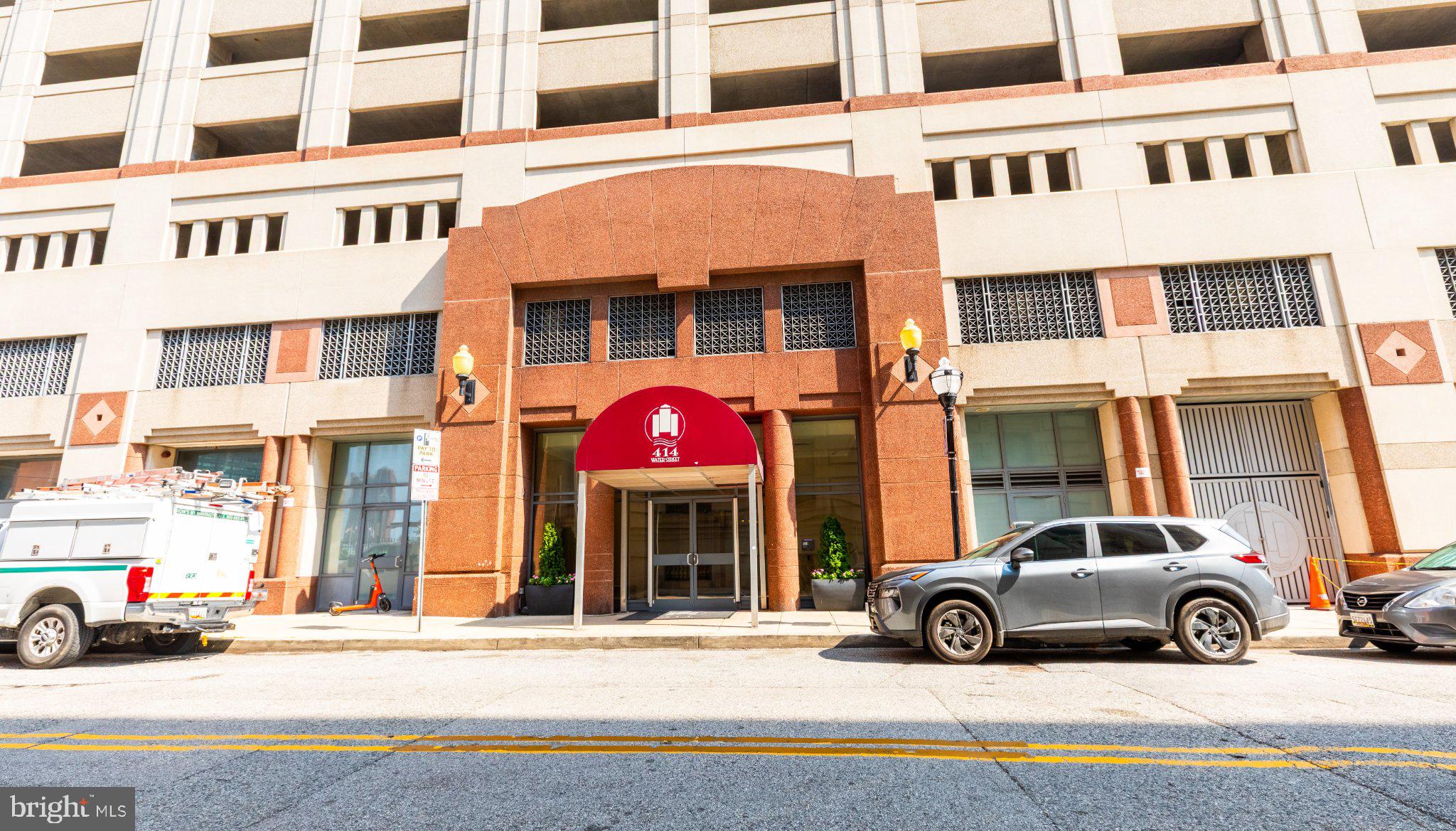 Elevated Downtown Living with Parking, Balcony, and Rare Same-Floor Storage!

Welcome to Unit 2007 at 414 Water Street, a freshly updated 1-bedroom, 1-bath high-floor condominium offering approximately 644 square feet of comfortable urban living and sweeping views of the Baltimore skyline. Recently freshly painted and thoroughly cleaned in preparation for its next owner, this bright, move-in-ready residence combines modern convenience with the ease of full-service condominium living.

The open-concept living and dining area features wood flooring, crown molding, abundant natural light, and access to a private balcony—an inviting place to enjoy morning coffee or unwind while taking in the city views. The kitchen offers upgraded countertops, generous cabinetry, gas cooking, and a complete suite of brand-new appliances, including a refrigerator, stove, dishwasher, and microwave.

Enjoy the convenience of an in-unit laundry area with a separate washer and dryer arranged in a space-saving stacked configuration—not a combined laundry-center appliance. Even more exceptional, the residence includes a rarely available approximately 4-by-6-foot private storage unit located on the same floor, directly across the hall from the apartment, providing exceptionally convenient space for luggage, seasonal belongings, household supplies, and more.

One assigned garage parking space is included and is conveniently positioned near the building’s secure entrance. Residents enjoy 24-hour front-desk and concierge service, lobby security, on-site property management, a two-level cascading outdoor pool, fitness center, business center, meeting and recreation spaces, and secure elevator access. The condominium fee includes gas, water, trash removal, parking, building insurance, management, exterior maintenance, and access to the community amenities.

Located approximately one block from Metro and two blocks from the Inner Harbor, Unit 2007 places downtown employment, waterfront attractions, dining, entertainment, shopping, and commuter routes within easy reach. This is a compelling opportunity to enjoy high-floor views, private outdoor space, dedicated parking, rare same-floor storage, brand-new appliances, and a freshly prepared interior—all in one amenity-rich downtown residence.