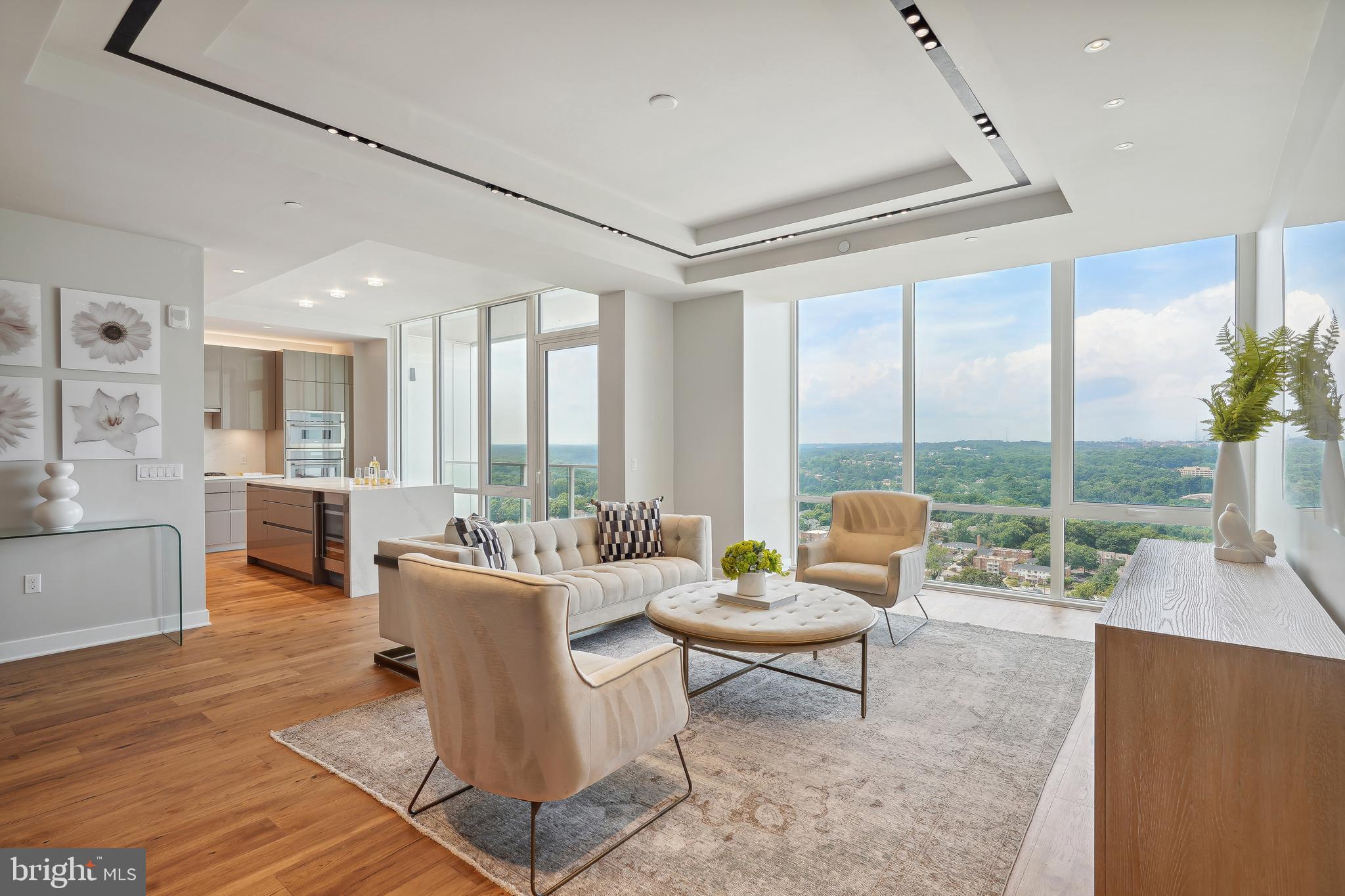 **Don't miss out, Seller is still open to offers!** Welcome to Pierce! AMAZING UNOBSTRUCTED VIEWS OF GEORGETOWN, THE POTOMAC AND  THE NATIONAL CATHEDRAL!   Looking for something spectacular?  This is the one.  Take the elevator directly into this open floorplan featuring 10 foot ceilings with floor to ceiling windows that offer jaw dropping views from every room. Top of the line chef kitchen featuring Thermador appliances, gas cooking, dual zone wine fridge, 7 inch hand scrapped hickory flooring, Snaidero cabinets and Quartz countertops with double waterfall islands. Stunning master bath with heated flooring, Bardiglio marble, Brizo faucets and spa inspired glass showers. The building amenity package is second to none featuring true white glove concierge services 24/7, double level fitness center, rooftop club room with outdoor dining and swimming pool.  A MUST SEE IN PERSON, PICTURES DON'T DO THE VIEW JUSTICE!