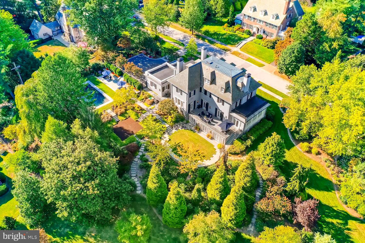 A masterpiece in the heart of historic Guilford. This premier estate situated on exquisitely landscaped .76 acres has been totally renovated and seamlessly expanded. Distinctive luxury finishes unify uber chic and timeless details. Significant architectural elements have been masterfully refabricated. New state of the art systems includes geothermal heating and cooling, smart lighting, audio and security systems, and whole-house generator. A sampling of updates, multiple expansions and additions include stylish new white kitchen with massive marble slab counters and duplicate deluxe appliances, a new mudroom addition, reconfigured sideloading garage, updated and new marble baths, new heated saltwater pool and multiple stone terraces. Elegant and grand light-filled rooms unite a multitude of remarkable entertaining spaces and warm intimate retreats. Imagine Olmstead celebrating the redesigned gardens with towering new specimen evergreens, pathways bordered by native and formal border gardens, and the new ellipse garden beneath canopies of golden ginkgo trees. A serene setting with expansive views in a beautiful neighborhood. Perfection.