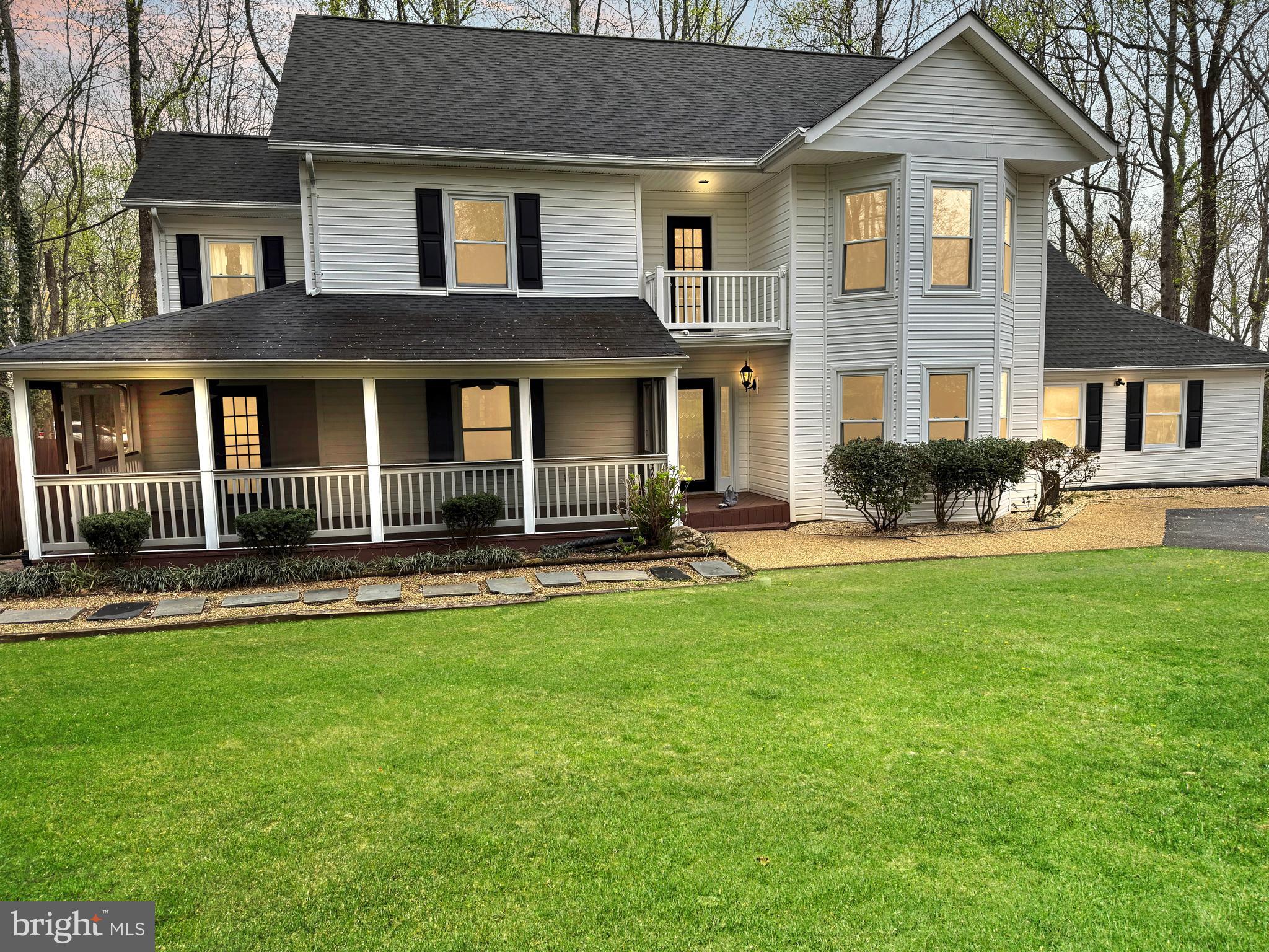 Assumable 2.75% VA Loan with a $350K balance.  Welcome to this beautifully updated home in the highly desirable, gated community of Aquia Harbour, where traditional charm meets refined comfort.  Situated on a peaceful cul-de-sac with minimal traffic, this residence boasts a large, private front yard with mature landscaping and a privacy hedge, ensuring tranquility and seclusion even before stepping inside.

Upon entering the home, you’re greeted by a spacious main level that seamlessly transitions between the kitchen, dining, and living areas. The kitchen is a chef’s dream, featuring custom wood cabinets, stainless steel appliances, a full wall of built-ins, and a large breakfast bar—perfect for casual dining or entertaining. Adjacent to the kitchen is the spacious dining room, which offers exterior access to a large, covered, fully screened front porch—ideal for relaxing and enjoying cool mornings and warm nights.

The main level also includes a large living room with sitting area, a formal living room, a half-bath, and access to the rear deck and 2-car garage. Upstairs, you’ll find generously sized bedrooms, including the large primary suite, which features a spacious walk-in closet, sitting area, and an updated en-suite bathroom with dual vanities and a full tile surround in the shower. The upper level includes two additional spacious bedrooms, a well-appointed full bathroom, and a second-story balcony, completing the upper floor. Fresh paint throughout the home’s first two levels ensures move-in readiness, creating a welcoming and clean atmosphere.

The fully finished, walk-out basement adds even more living space and flexibility, offering a large flex space, a full bathroom, laundry, and ample storage. The basement’s flexible layout also accommodates the creation of a fourth bedroom with an en-suite—ideal for guests, family, or as a private retreat.

Additional highlights include: Updated roof, HVAC, and appliances—all less than 5 years old—along with a 2-car garage, storage shed, and backyard gazebo.

Nestled within the highly sought-after Aquia Harbour community, residents enjoy access to a wealth of amenities, including  a golf course, marina, stables, 7 parks, walking trails, sports courts and more! With easy access to I-95 and proximity to Quantico, this neighborhood is perfect for those commuting north or south.

Don’t miss the opportunity to own this exceptional home!