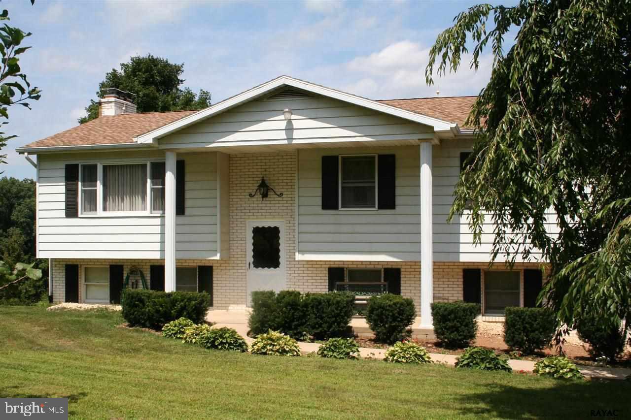 4-5BR, 2.5BA raised ranch on 10.96 secluded acres. Eat-in-kitchen with stainless steel appliances and walk-out to rear deck, family room with stove in lower level, plus 3-seasons room. 2-car oversized garage, 4-stall 48x26 barn, shed, fenced for horses. Minutes to Maryland/Pennsylvania line. Low taxes/Clean and Green.