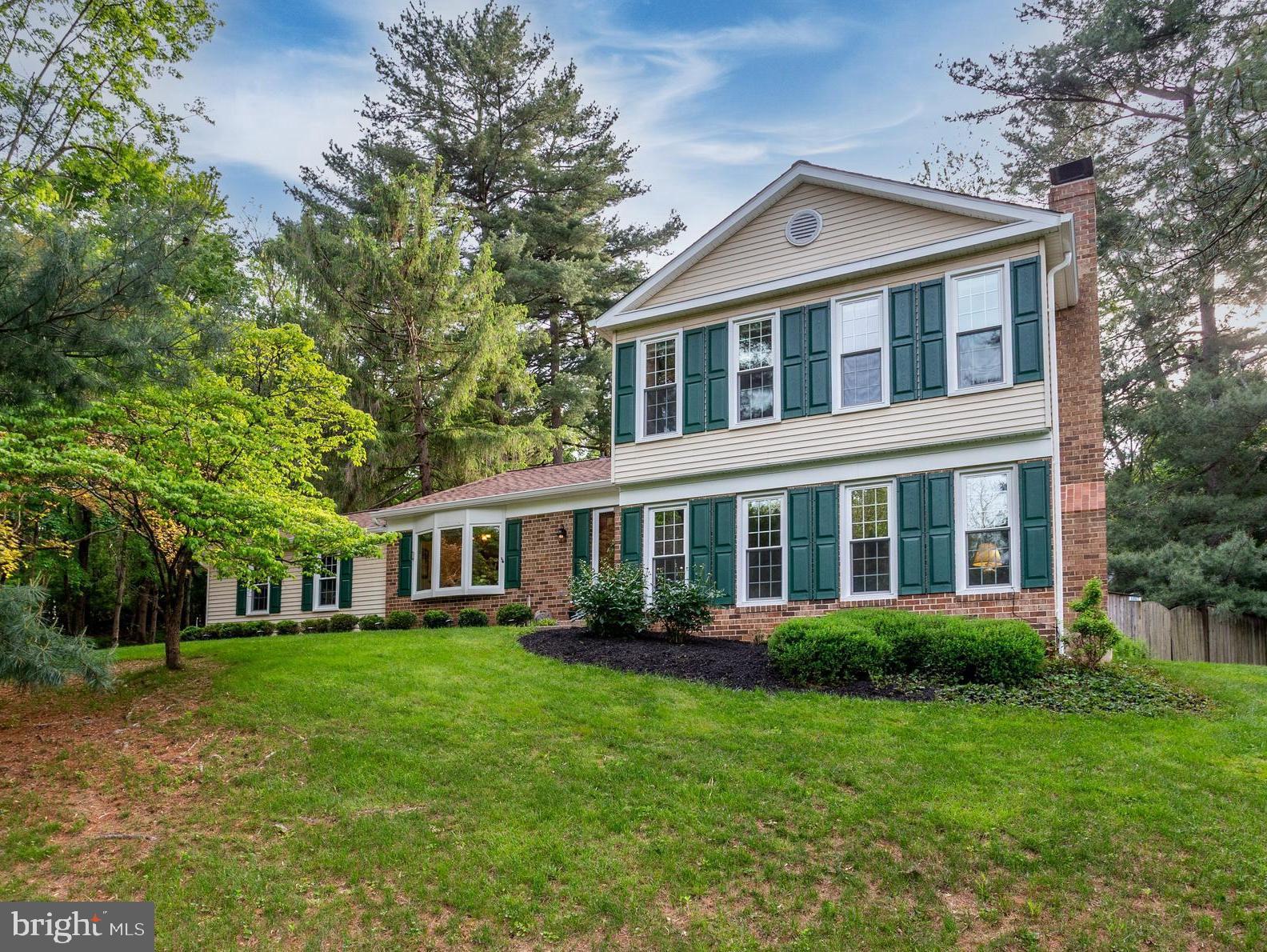 Welcome to 5421 Huckleberry Lane, a lovely 4-level 2,065 sq.ft. home in the sought-after neighborhood of Parkside! Nestled on a beautifully landscaped .76-acre cul-de-sac lot, this spacious 4-level split offers privacy, charm, and peaceful surroundings with a partially wooded setting and a home site tucked back off the road.  So convenient to shopping, schools and commuter routes.  And just 10 minutes to the award winning Downtown Sykesville with its locally owned boutiques, delish dining, Farmers Market and family-friendly events. The Entry Foyer includes hardwood flooring and a guest closet. Crowd-sized Dining Room also has hardwood flooring, chair rail and crown molding with a slider to the private screened porch (15'4" x 15'4"). Updated Kitchen features beautiful light cherry raised panel cathedral top cabinets, granite counter tops, pantry closet, stainless steel appliances, Butler's Pantry, a 3-panel bay window and entrance to the garage. The cozy Den has hardwood flooring, chair rail, crown molding, overhead lighting and a slider to the back patio deck (14'6" x 14'2"). Large Family Room with new carpet (2025) includes lots of natural light, a ceiling fan, brick wall fireplace with a wood stove insert, brick hearth and mantel. The Powder Room is between the Family Room and Rec Room. The Rec Room includes multiple storage closets, the Laundry closet with the washer, dryer, laundry tub and shelving and an exit to the back yard. The 4th level sub-basement (27' x 21') includes the utilities and lots of room for a workshop and storage. The Upper Level offers the Primary Bedroom with hardwood flooring, ceiling fan, walk-in closet and the updated Ensuite Full Primary Bathroom with ceramic tile flooring, upgraded vanity, fixtures, lighting, wall mirror and a stall shower with tile and stone surround, a seat, rain shower head, hand wand, built-in soap dishes and a handy wall niche. Bedrooms 2-4 also feature hardwood flooring and ceiling fans. The refreshed Full Hall Bathroom (2025) includes ceramic tile flooring, a new vanity, fixtures, lighting and wall mirror and a shower/tub combination. The beautiful fenced back yard offers lots of perennials like Hydrangea, Peony, Azaleas, Hosta, Pachysandra, Rhododendron and more! Additional updates include double hung/double pane windows and (2) sliding glass doors (2009/2010), Kitchen (2009) plus Frigidaire French door refrigerator (2022) and microwave (2024), Trane HVAC (2014), 71 gallon Rheem Marathon water heater (2019), architectural shingle roof (2019) and the expansive shed with double doors (2022). With this home, you'll truly enjoy modern updates, lots of functional space, and move-in-ready convenience.