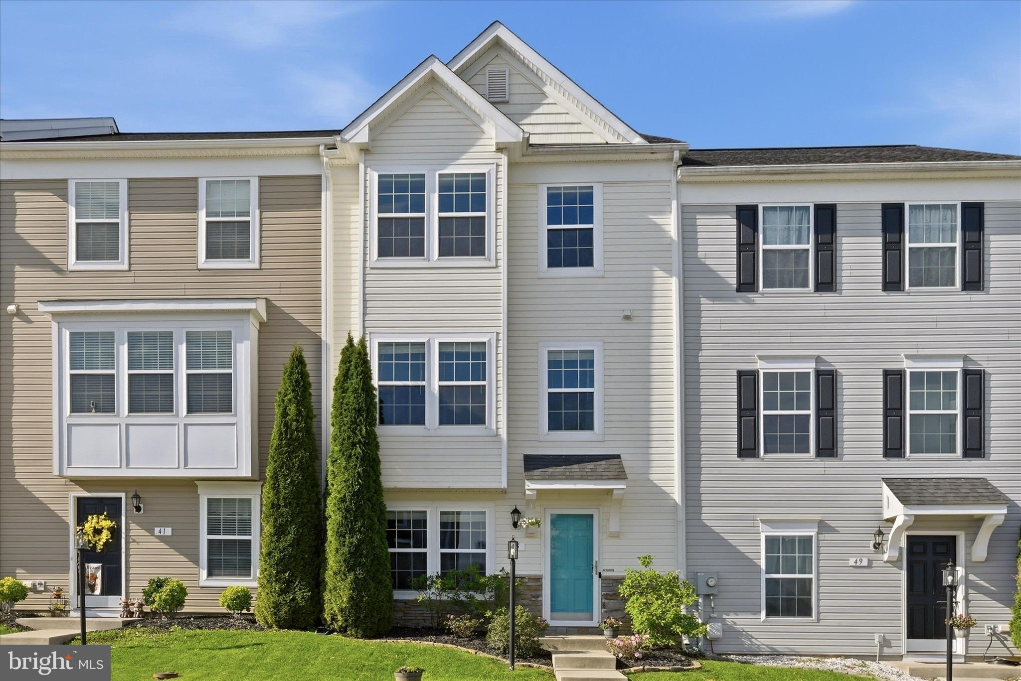 Welcome to 45 Britania Court in Kensington Terrace! This three-level townhome offers over 2,000 finished square feet with 3 bedrooms, 3 full bathrooms, and 1 half bathroom. The main level features a bright, open layout with a spacious living area, dedicated dining space, and a kitchen with stainless steel appliances, ample cabinet storage, and great everyday functionality. Upstairs, you’ll find comfortable bedroom spaces, including a primary suite with its own full bathroom. The finished basement adds even more flexibility with an additional room that could be used as a home office, guest space, workout room, or possible 4th bedroom. Enjoy the vinyl-fenced backyard, 2 assigned parking spots, and a convenient Martinsburg location close to commuter routes, shopping, dining, and local amenities.