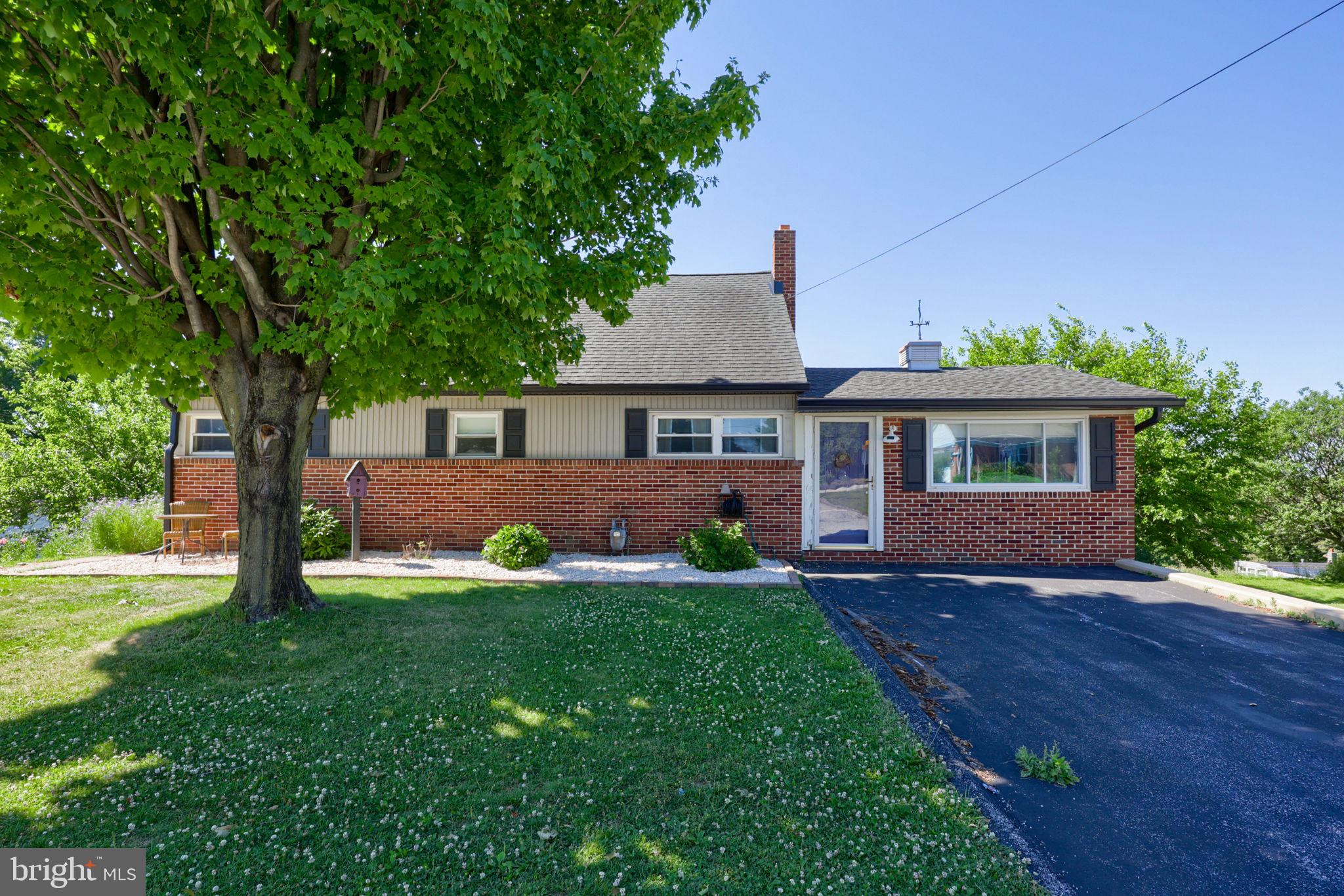 Welcome home to this charming all-brick property nestled on a quiet cul-de-sac and within walking distance of Red Lion Schools. Offering 4 bedrooms and 2 full baths, this home provides flexible living space for a variety of lifestyles. The main level features two bedrooms, a full bath, a spacious living room, family room, and kitchen. Upstairs, you'll find two additional bedrooms, a full bath, and a large walk-in cedar closet. Car enthusiasts, hobbyists, and contractors will appreciate the incredible garage space, including an attached 1-car garage and an oversized heated 4-car garage/workshop. The lower-level basement offers additional storage, workspace, or future finishing potential. Step outside to enjoy the private, fenced rear yard, ample parking, and numerous updates throughout the home. All appliances convey, making this move-in-ready property an exceptional value. Don't miss this unique opportunity to own a well-maintained home with abundant living space, garage capacity, and a desirable location!