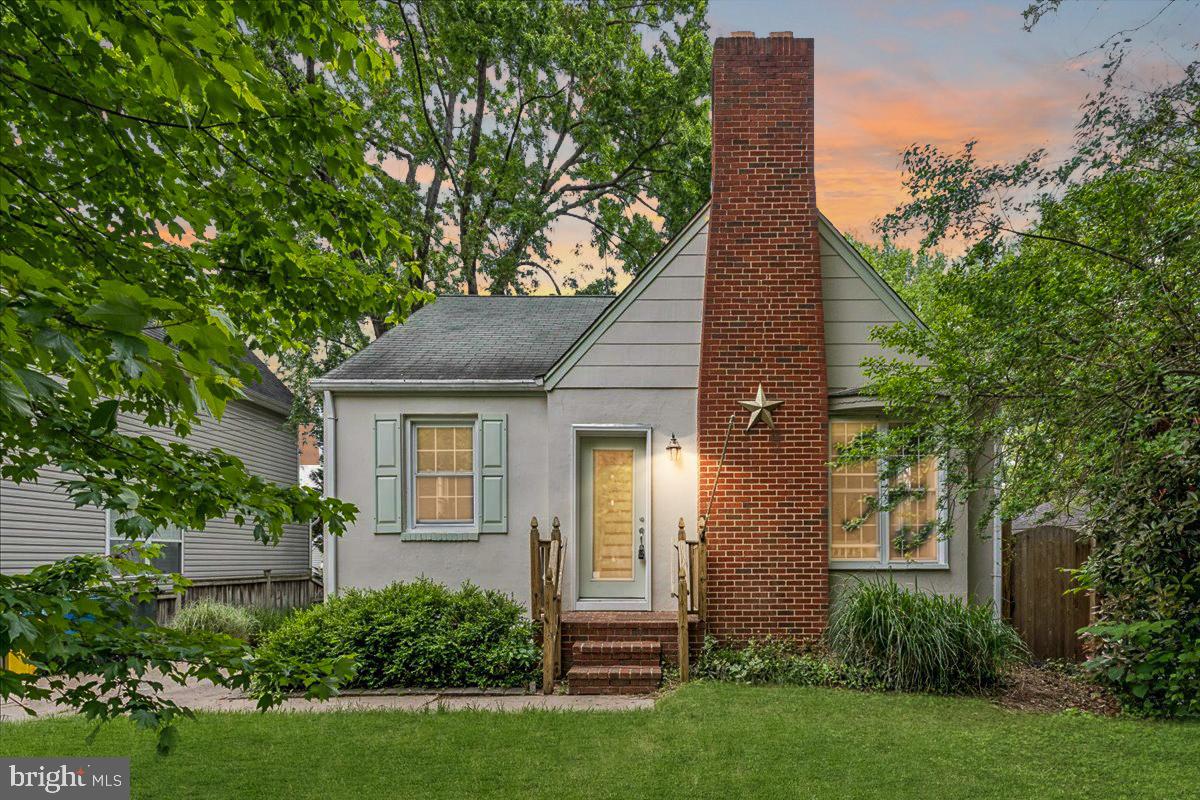 Welcome to this charming Cape Cod just minutes from downtown Annapolis and Eastport, where classic 1950s character meets thoughtful modern updates. Hardwood floors and original architectural details set the tone on the main level, with abundant natural light filling the living room and highlighting a cozy wood-burning fireplace. The updated eat-in kitchen features granite countertops, a peninsula for casual dining, and easy flow for everyday living and entertaining. Two spacious bedrooms and a full bath complete the main level, while upstairs the entire level is dedicated to a private primary retreat with a walk-in closet and a beautifully appointed ensuite bath featuring a soaking tub, walk-in shower, and dual vanity. The expansive, fully fenced backyard offers exceptional outdoor space with a deck and extensive hardscaping already in place, plus plenty of room to garden, entertain, or even design a future pool. The unfinished lower level provides great ceiling height, walk-out access to the yard, and excellent storage with potential to finish. With quick access to Forest Drive and Route 50, and just moments from Truxton Park, Pip Moyer Recreation Center, Spa Creek trails, tennis courts, and the public boat ramp, this location delivers some of the very best of Annapolis living.