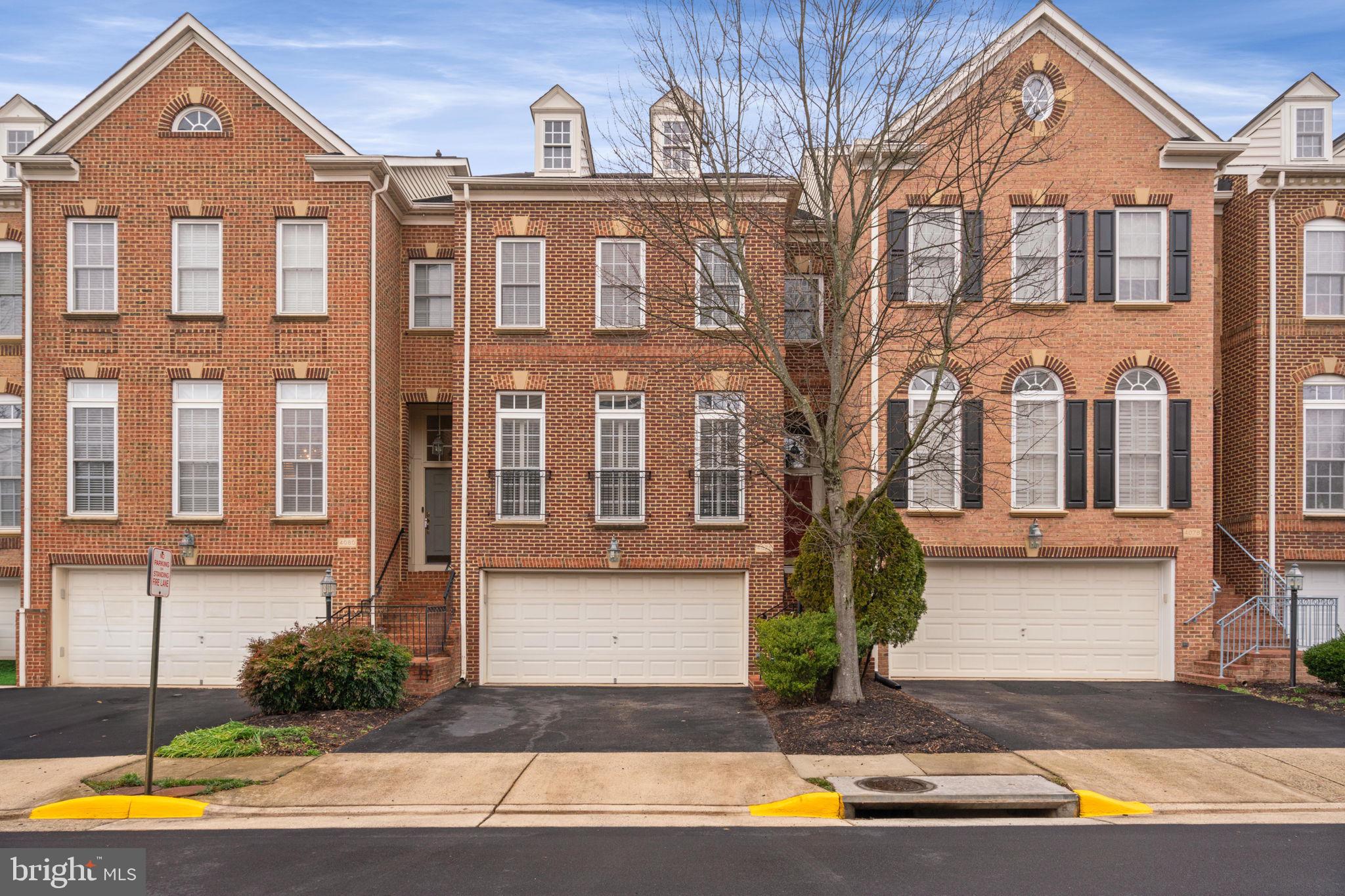 Showings will start at 12pm on Friday Feb 16th and end at 4pm on Sunday Feb 18th. There are two scheduled open houses - (1) Saturday Feb 17th 11am - 3pm and (2) Sunday Feb 18th 12pm to 2pm. All offers due to listing agent by 12pm on Monday Feb 19th. 

Elegant Townhome in Stone Creek Crossing, Fairfax. Discover luxury in this beautifully updated townhome in Fairfax's sought-after Stone Creek Crossing. This home features a spacious open floor plan, combining a large living and dining area with an expansive, well-equipped kitchen. The kitchen shines with stainless steel appliances, granite countertops, a large island, plentiful cabinet space, and opens to a deck with views of a private backyard and lush treed area.

Refined details include refinished hardwood floors throughout most of the home, 9' ceilings, and upscale finishes such as plantation shutters and crown moldings. The home has been freshly painted throughout. The owner's suite boasts hardwood floors, tray ceiling, walk-in closet, and a large bathroom with double vanities, a soaking tub, and a separate shower. The convenient second-floor laundry room makes chores a breeze. Relax and unwind in the finished walk-out lower with a huge recreation room and cozy gas fireplace. The lower level walks out to a private brick-paver patio and fenced back yard, perfect for enjoying warm evenings.

Additional features include a double garage with extra storage and ample driveway parking, plus guest spots. Enjoy peace of mind with HVAC, refrigerator, and microwave all replaced in 2022. Enjoy easy commuting and access to dining, shopping, and entertainment near Fairfax County Parkway, Route 50, I-66, and minutes to Fair Lakes and Fair Oaks Mall. Don't miss your chance to tour this immaculate townhome close to it all!