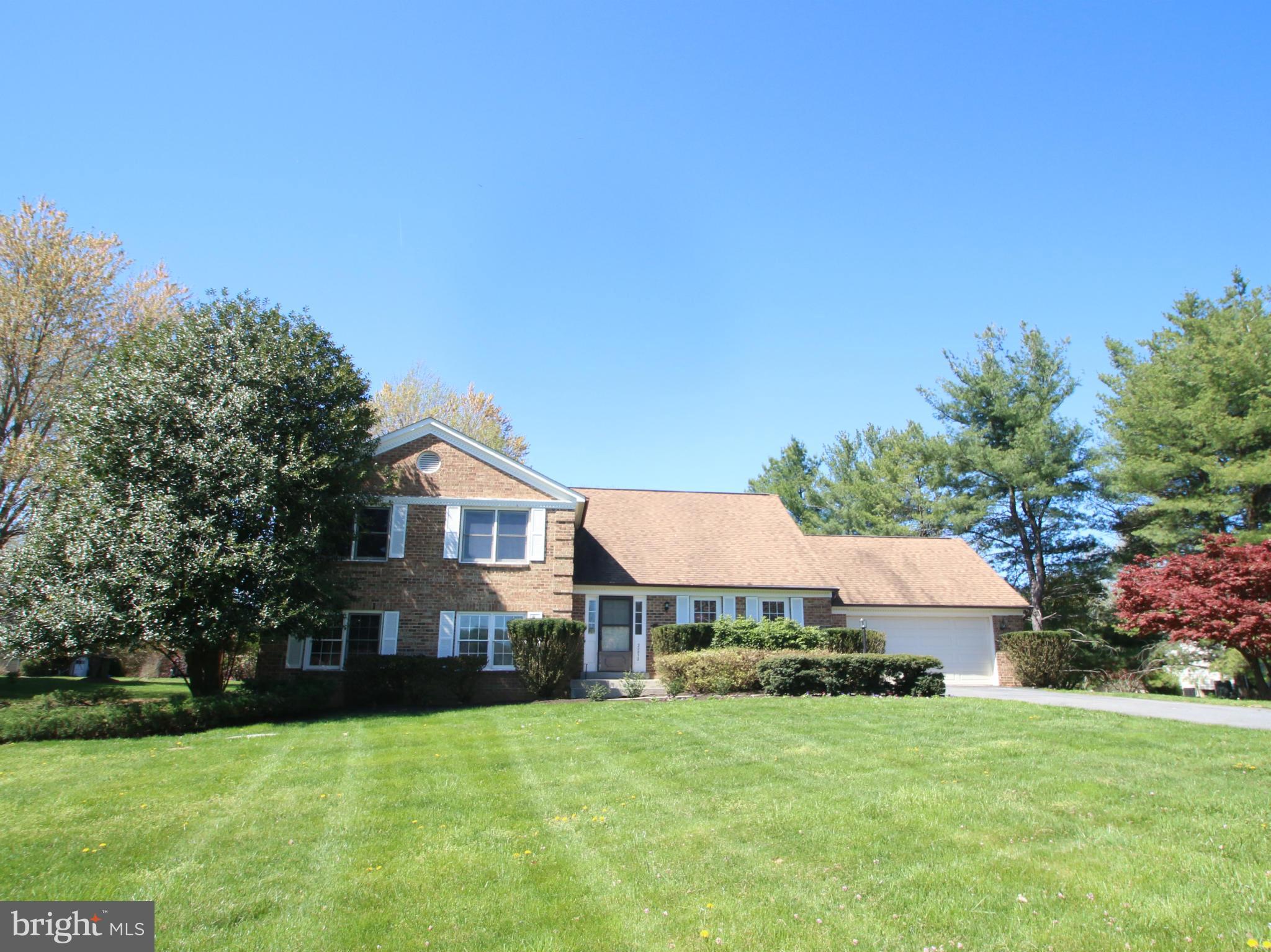 New Price Reduction! Gorgeous 4 Level Split on Fantastic 1+ acre lot in neighborhood of custom homes. 5 spacious BRs - 3 updted Baths, incl.Grand Master Suite w/ sitting room & luxury bath. Eat-in Kitchen with SS appl. Wet Bar adjoining Family Room with brick fire place. 2 car garage, Beautiful Tree-Lined drive and yard, Large deck, outdoor swimming pool & hot tub. MUST SEE!  Open Sun, 6-12 fr 1-3