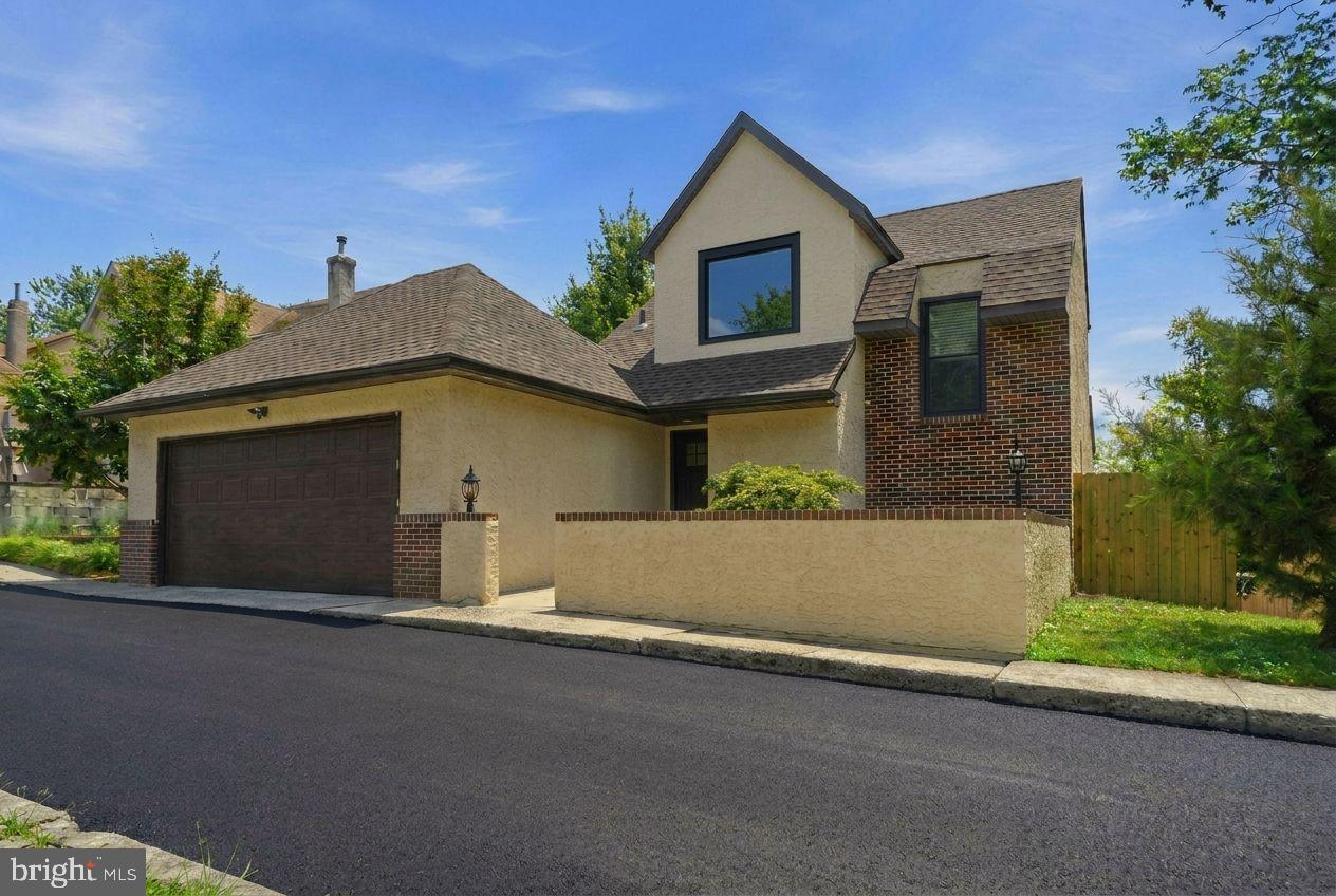 Tucked away on a private, secluded street just off City Avenue, this completely reimagined 4-bedroom, 3.5-bath home is the rare find buyers have been waiting for — a fully gut-renovated masterpiece in the heart of Wynnewood with every major system replaced in 2026.
From the moment you step inside, the transformation is unmistakable. Wide-plank white oak hardwood floors stretch across a sun-drenched, open-concept great room that flows effortlessly into a chef's kitchen designed to impress. Custom white shaker cabinetry rises floor-to-ceiling, flanking a striking two-tone island and a full-slab Taj Mahal quartzite backsplash that serves as the room's crown jewel. The professional Thermador appliance package — including a 36" gas range, French door refrigerator, and speed oven — means this kitchen isn't just beautiful, it performs.
The primary suite is a true retreat, offering two walk-in closets and a spa-caliber marble bathroom that stops people in their tracks. Floor-to-ceiling Carrara marble wraps an oversized walk-in shower with dual rain heads, dual handheld wands, and body sprayers — all Delta fixtures — alongside a large double vanity. It's the kind of bathroom you find in boutique hotels, not residential listings.
The large walk-out basement adds tremendous flexible living space — finished, bright, and move-in ready with its own separate exterior entrance, recessed lighting, and LVP flooring. A dedicated laundry room and generous storage round out a home that was built to live as well as it photographs.
Every box checked for peace of mind: new roof (2026, 10-year warranty), new windows (2026), new HVAC (2026), updated electrical, and updated plumbing. This isn't a cosmetic flip — it's a comprehensive renovation.
Zoned for Penn Wynne Elementary, Black Rock Middle School, and Lower Merion High School — consistently ranked among the top public schools in Pennsylvania and the nation.
Private entrance. Premium finishes. Top-ranked schools. This one won't wait.
