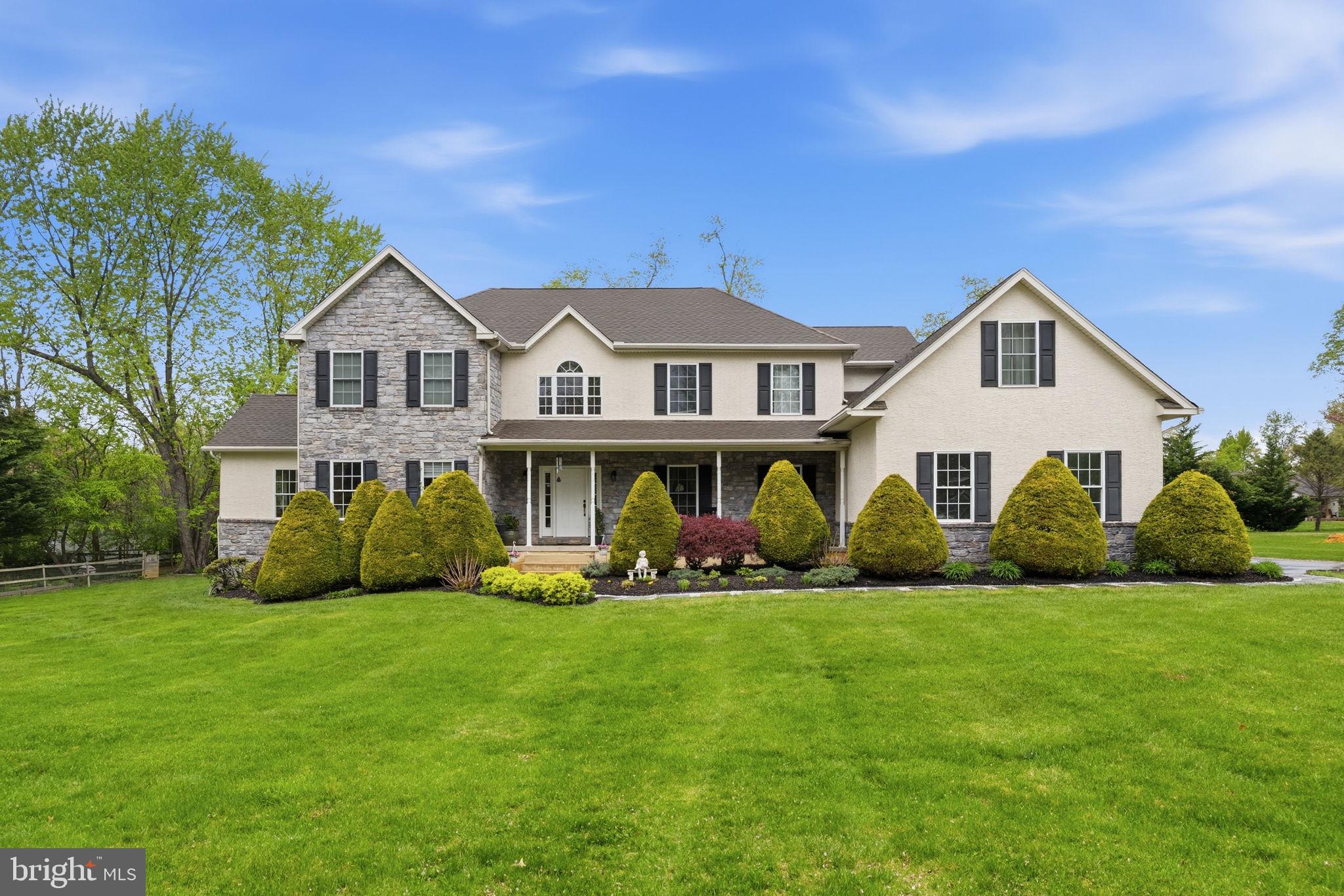 Spacious, sunny, and versatile, this thoughtfully designed colonial sits on a private 1.2-acre flag lot and offers a rare combination of luxury, privacy, and accessibility. Featuring 5 bedrooms, 5.1 baths, an elevator, and wheelchair-accessible living spaces, this home is truly unique. A dramatic 2-story center hall entry is flanked by a formal living room and oversized dining room. The bright first-floor features a beautiful Sun-Room with a Palladian window an access to the Living Room & Family room.  The upscale cherry kitchen offers an oversized island with seating, 42-inch cabinetry, gas cooktop, wall oven, and breakfast area opening to the family room with fireplace. The first-floor bedroom offers wheelchair-accessible bedroom includes a private exterior entrance with ramp access and a large wheel-in tile shower. A conveniently located elevator provides access to the second floor and basement. Hardwood floors engineered with three-zone radiant heat flow throughout the main level.
Upstairs, French doors open to the oversized primary suite with hardwood flooring, his/her walk-in closets, and a 4-piece bath with whirlpool tub. Three additional spacious bedrooms include two private baths, and all offer generous closet space. An additional sitting room or storage area includes two large walk-in closets and elevator access.
The expansive daylight walk-out basement includes an updated full bath and offers excellent potential for future finished living space. Additional features include a new boiler for the 3-zone whole-house radiant heat system and ductwork for central air conditioning., 2nd floor has its own zone. Great location & access Rt. 202, DE & roadways to Philadelphia!