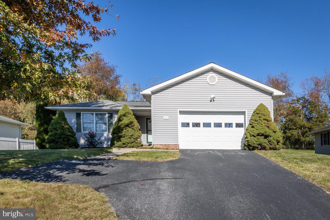 This meticulously maintained home resides in a fantastic location just inside the northern town limits of Bridgewater. Price Dr is a dead end street steps away from John Wayland Elementary and Turner Ashby High School. Highlights include one-level living, a large open great room, a private primary suite, an eat-in kitchen and laundry room. Attractive hardwood flooring is located throughout the main living areas. The bedroom in the front of the home, currently being used as an office, has direct entry to the hall bathroom offering privacy for overnight guests. A pass-through opening above the kitchen sink connects the great room when entertaining friends and visitors. The two car garage boasts an abundance of storage space. Enjoy a large rear yard that allows ample room for garden space and play.