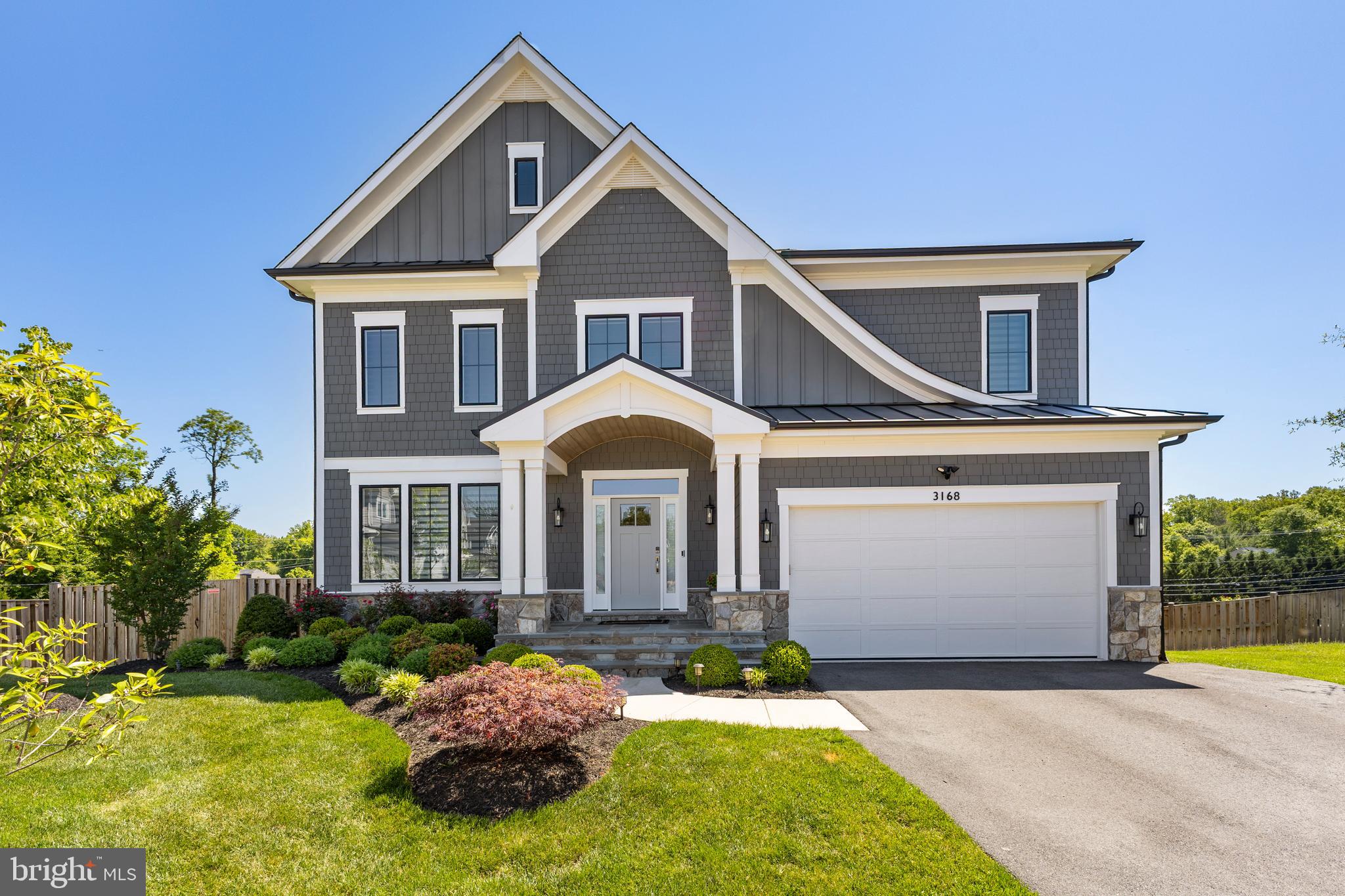 Welcome to 3168 Pond Mist Way, a turnkey-ready home built by J.D.A. Homes LLC. This modern open-concept home is less than five years old and features luxurious Mohawk hardwood flooring throughout the main floor. The formal dining area opens into the family room, breakfast room, and kitchen, creating a spacious environment perfect for hosting family gatherings. The living space includes a gas fireplace framed by granite that matches the kitchen counters, along with a custom backsplash throughout the kitchen. On the main level, there is a room that can serve as a study or office. The mudroom, located off the garage, features built-in cubbies and a large closet. Step outside to find a custom-built, large deck with built-in lights along the steps. The master bedroom includes double walk-in closets, while the master bathroom boasts a soaking tub and a large walk-in shower. Bedroom 2 has its own en suite bathroom, while Bedrooms 3 and 4 share a Jack and Jill bathroom; Room 3 features a walk-in closet. The large laundry room comes equipped with a sink and a closet, along with access to the attic, which has been insulated with energy-efficient foam. The lower level of the home includes a gym with heavy-duty rubber flooring, an additional bedroom (Bedroom 5), and a full bath, as well as a spacious recreation room. The rear entrance has a walk-out to a large, fenced-in backyard. For security, the exterior of the home is equipped with seven cameras featuring motion detectors and lights.The location offers easy access to I-66, Route 50, Route 28, the Dulles Toll Road, and the Fairfax County Parkway. Nearby amenities include Fairfax Corner, Fairfax Towne Center, Fair Oaks Mall, Reston Town Center, Fox Mill Shopping Center, and Fair Lakes Shopping Center. Additionally, Wegmans, Whole Foods, and Costco are all close by, along with convenient access to Dulles Airport.