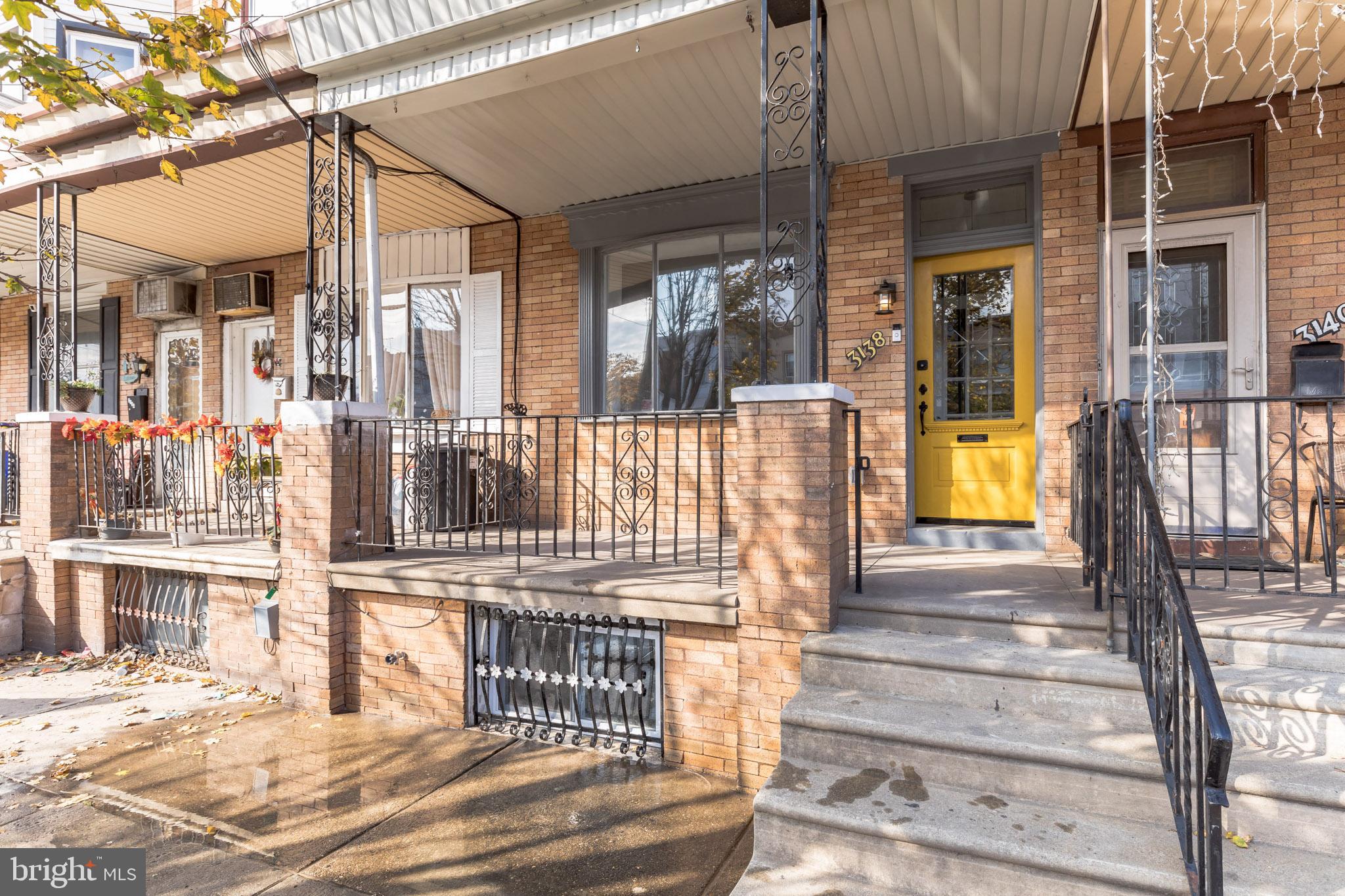 Porch front living in Port Richmond!   Tired of cookie cutters in this price range?  This 3 bedroom, 1.5 bath house is a great blend of new + old.  Before entering you'll see the fully restored 1940's "Hollywood" door that was manufactured in Philly.  Vestibule entrance w/ original 15 pane door + hardware.  Hardwood floors t/o, recessed lighting, new sheetrock, trim + paint, new windows, ceiling fans, doors + fixtures.  New kitchen w/ granite counters,  white cabinets, + stainless steel package. Custom built floating shelving w/ pendant light.   Huge mud + laundry area on rear of house that leads to rear yard.  Master bedroom is expansive w/ 3 windows, huge closet + accent wall.   2 additional good size bedrooms.  Master bath has new tub + surround, vanity + skylight.   Partially finished  basement w/ mechanical room. New 100amp service, 90% central air + heat, new plumbing.  Nest Thermostat, Ring Doorbell + skylights.