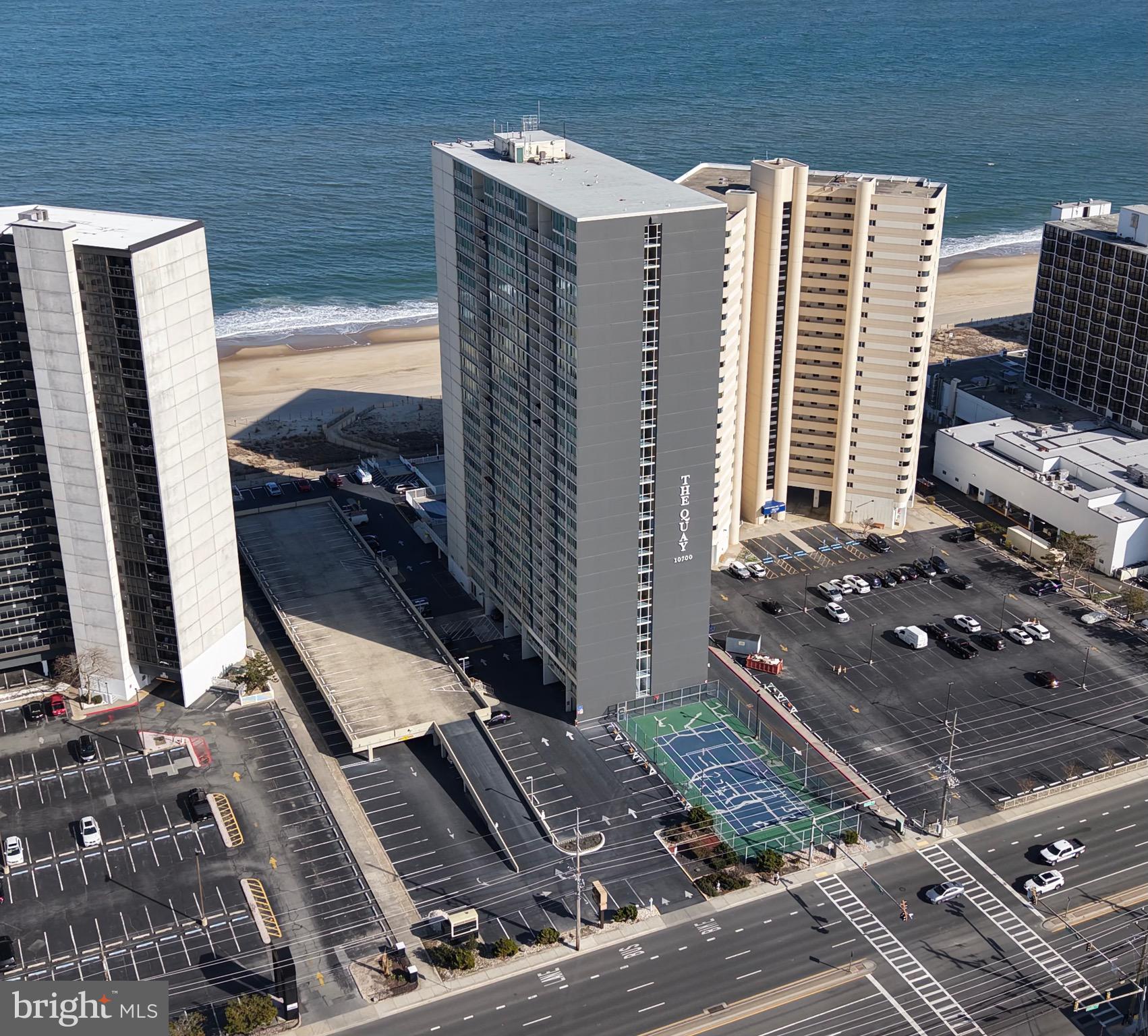 Gorgeous  Turn Key 2 Bedroom 2 Bathroom with Southern Exposure & Ocean, Bay & City Views in the  Oceanfront Quay Building ! This beautiful unit is a larger Open Concept unit  with LVP flooring  in the living area .  Lots of room to entertain with Loveseat plus a Sleep sofa for guests. Fully Equipped Kitchen features Stainless Steel Appliances  & Granite Countertops  Master Bedroom with King Bed, en suite  with Walk in Shower.  Spacious Guest Bedroom  and Guest Bath. Private Balcony with Stunning Views. Washer/Dryer in unit. Hot Water Heater replaced in 2021 & HVAC  in 2018 . The Quay offers Indoor& Outdoor pools, Fitness center,  Game room , Party room, Meeting room Ping Pong room & Tennis court.   Lobby entrance  has  24 hour Security  desk.