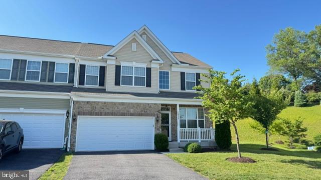 With a total of 3,463 square feet, this home is designed for both comfort and style. Built in 2016, this Colonial boasts 3 spacious bedrooms and 4.5 elegant bathrooms, providing ample space for relaxation and entertaining. Step inside to discover a beautifully finished interior, highlighted by a cozy fireplace that invites warmth and comfort. The fully finished basement adds versatility, perfect for a home theater, hobby space, or guest suite.  The property features an attached garage with space for two vehicles and a driveway, ensuring convenience for you and your guests. Enjoy the meticulously maintained common grounds, where you can stroll and connect with neighbors in this vibrant retirement community. The association fee covers essential services such as lawn maintenance, trash removal, and insurance, allowing you to focus on enjoying life. Experience the peace of mind that comes with living in a community that prioritizes your comfort and security. Indulge in the exclusive lifestyle that Greenvale Mews offers, where luxury meets tranquility. This is more than just a home; it's a place to create lasting memories and embrace a fulfilling life. Don't miss the opportunity to make this stunning property your own.