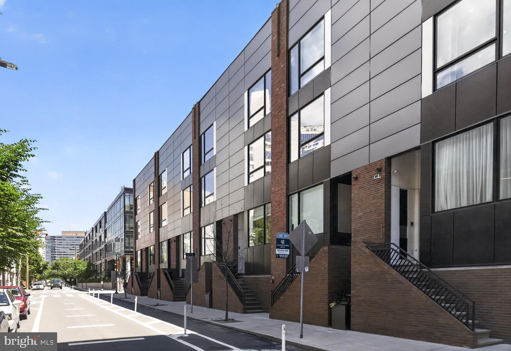 Welcome to 117 N 23rd Street, an exceptional luxury townhome in the heart of Philadelphia's coveted Logan Square neighborhood, offering an unmatched combination of location, lifestyle, and amenities rarely found in the city.

Positioned just steps from the Schuylkill River Trail, the renowned Fitler Club, Rittenhouse Square, and some of Philadelphia's most celebrated dining, shopping, and entertainment destinations, this residence places the very best of Center City right outside your door.

Behind the security and privacy of the gated Logan23 community, this sophisticated home offers a private elevator servicing every level, an attached 3-car garage, multiple outdoor living spaces, smart home technology, and tax abatement good through February 2033.

The main living level was designed for both everyday comfort and entertaining, featuring wide-plank hardwood flooring, a chef's kitchen with premium Wolf and Sub-Zero appliances, quartz countertops, custom cabinetry, and a spacious living area with slider to a private balcony that extends the living space outdoors.

The second level features two generously sized bedroom suites, each with its own full ceramic tile bathroom and ample closet space, along with a conveniently located laundry area.

Occupying an entire private floor, the primary suite offers a true retreat from city life. The spacious bedroom opens to a private balcony overlooking the gated courtyard, while the custom walk-in closet and spa-inspired bathroom feature dual vanities, a freestanding soaking tub, and an oversized glass-enclosed shower.

At the top of the home, a spectacular rooftop deck steals the show. With breathtaking panoramic views of the Philadelphia skyline, this incredible outdoor space was built for entertaining, relaxing, and taking in the energy of the city. Whether hosting friends, enjoying a quiet evening under the lights of Center City, or watching the sunset over the skyline, this rooftop experience is simply unforgettable.
Luxury, convenience, privacy, and one of Philadelphia's most walkable and desirable locations come together at 117 N 23rd Street.  Opportunities like this are exceptionally rare.