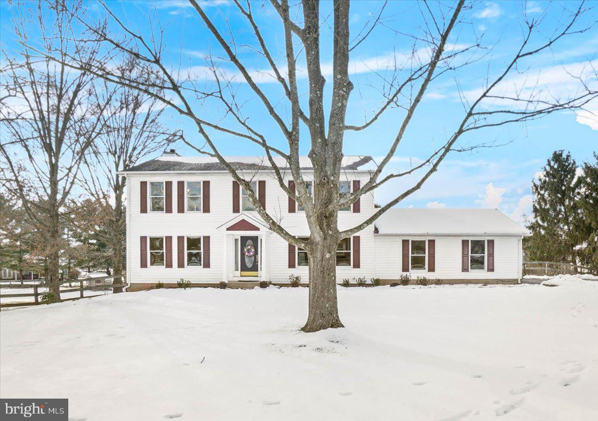 Welcome to 3112 Kemptown Church Rd – conveniently located in Monrovia and in the desirable Urbana High School district!  Situated on a sprawling lot of 1.15 acres with a fenced backyard.  The heart of the home is the main level featuring granite countertops, luxury vinyl flooring, stainless steel appliances, breakfast room, open to the lovely family room with a wood burning fireplace, crown molding and access to the oversized deck, living room open to the family room gives a wonderful open flow and a separate formal dining room/office with crown molding freshly painted with neutral palate. The primary suite is a true retreat with a walk-in closet, soaking tub, separate shower and double vanity.   The entire upper level is complemented with hardwood flooring.  Bathrooms have ceramic flooring and the laundry with washer/dryer is located on the upper bedroom level.  The lower level consists of a walkout basement opening to a patio, a sizable family room, game room, the fifth bedroom/office, a newer full bath, and a versatile bonus/storage room. Parking is a breeze with a two-car garage and a driveway that accommodates at least six more vehicles. The backyard is very private and backs to trees, a great place for outdoor entertaining, gardening or enjoying your flock of chickens.   This move-in ready home is located less than a 1/8th mile from Montgomery County and is convenient to major highways.  This home seamlessly blends modern amenities with a welcoming atmosphere, making it a must-see for discerning buyers. Located within walking distance of Kemptown Park, this home offers both convenience and a serene lifestyle.