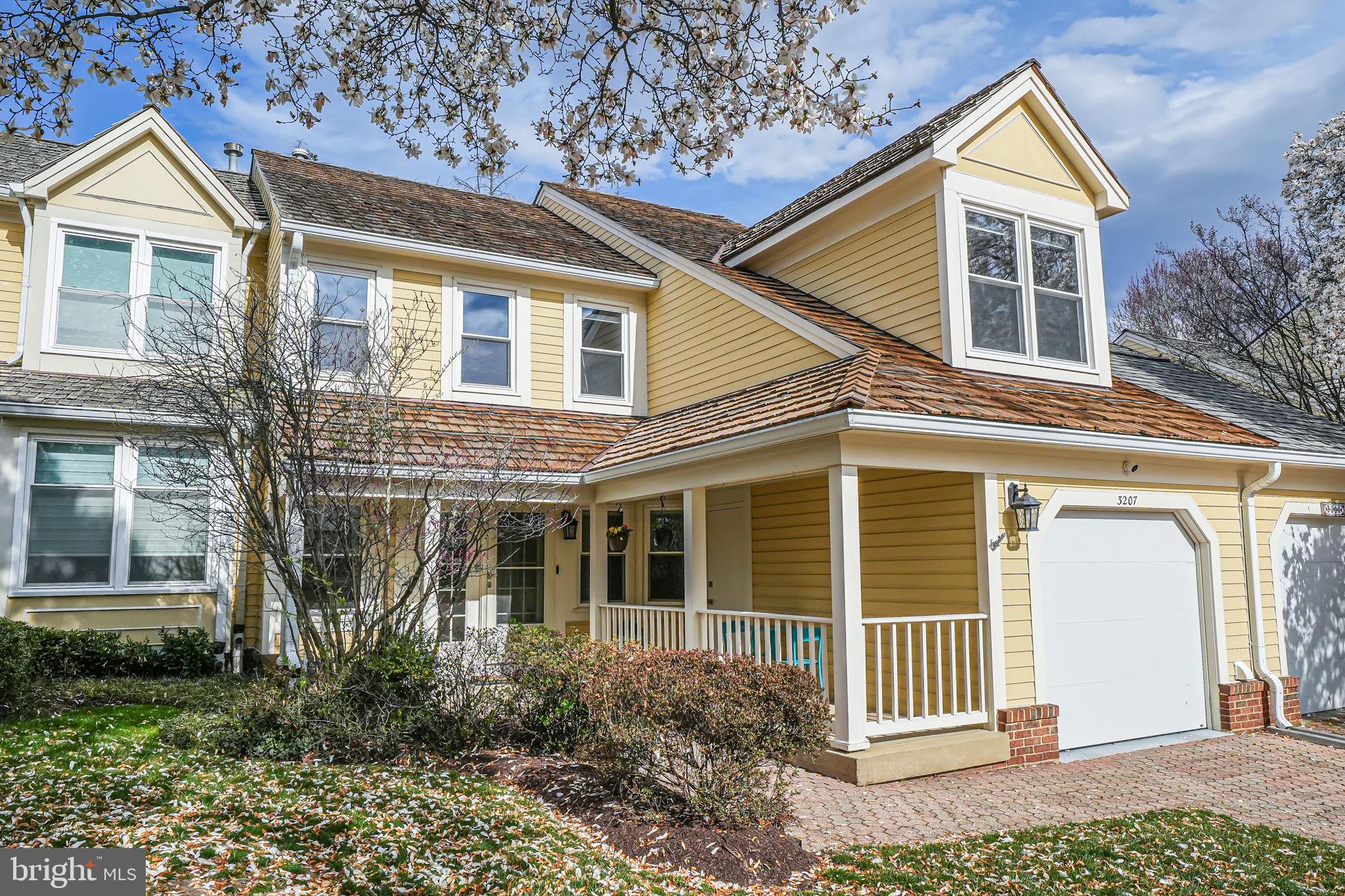 **Any offers requested by 10am Tuesday, April 1**.   Nestled in a serene N Arlington cul-de-sac, this elegant, fully renovated townhome offers nearly 4,000 sq ft of style and sophistication. The open main level, filled with natural light, features a double-height foyer, vaulted living room with skylights, stone fireplace, and access to a fenced patio. The kitchen, open to both formal and casual dining areas, boasts stainless appliances, granite countertops, and ample storage. A third bedroom/den and full bath complete this level.

Upstairs, the spacious owner’s suite includes a vaulted ceiling, custom walk-in closet, and spa-like bath with double sinks, a frameless shower and herringbone tile. An expansive second bedroom with a custom closet and renovated hall bath, plus an extra walk-in closet, add to the convenience.

The finished lower level offers a guest room/office (no window, but legal egress from rec room), a full bath, and a rec room with a bar—perfect for game nights! A large laundry and storage room add functionality. 

With an attached garage and easy access to the E Falls Church Metro, Westover, and downtown Falls Church, this home blends tranquility with unbeatable convenience.

Updates: 2023 - Refrigerator; Downstairs kitchen; Garage flooring improved; Painted garage interior. 2020 - 3 all new full bathrooms on upper and main level; All new interior doors and hardware; New oak hardwoods upstairs; Refinished throughout to match; New LVP floors in lower level; Storage and laundry room created in lower level; Replaced stairwell railings; All new lighting fixtures throughout upper levels; Up-down shades installed; New stone fireplace surround; Google nest camera/security/smoke alarms/thermostats installed; New kitchen appliances. 2015 - New Hardie board siding. 2006 - New 30 year roof; New windows.