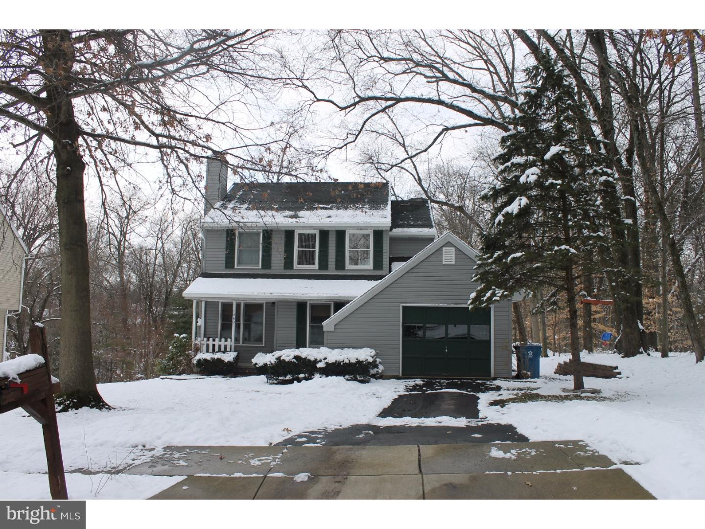Lovely, completely updated four bedroom home.  One bedroom is in finished walk-out basement along with a family room.  Living room with gas fireplace.  Recently updated kitchen with granite counters, newer stainless steel appliances and new flooring.  Both bathrooms have been updated.  Large 20x15 deck looking out on a lovely yard.  This home is situated at the end of a quiet street giving it nice privacy.  Newer roof and new siding and gutters with guards last year.  This lovingly maintained home is ready for you to move in.