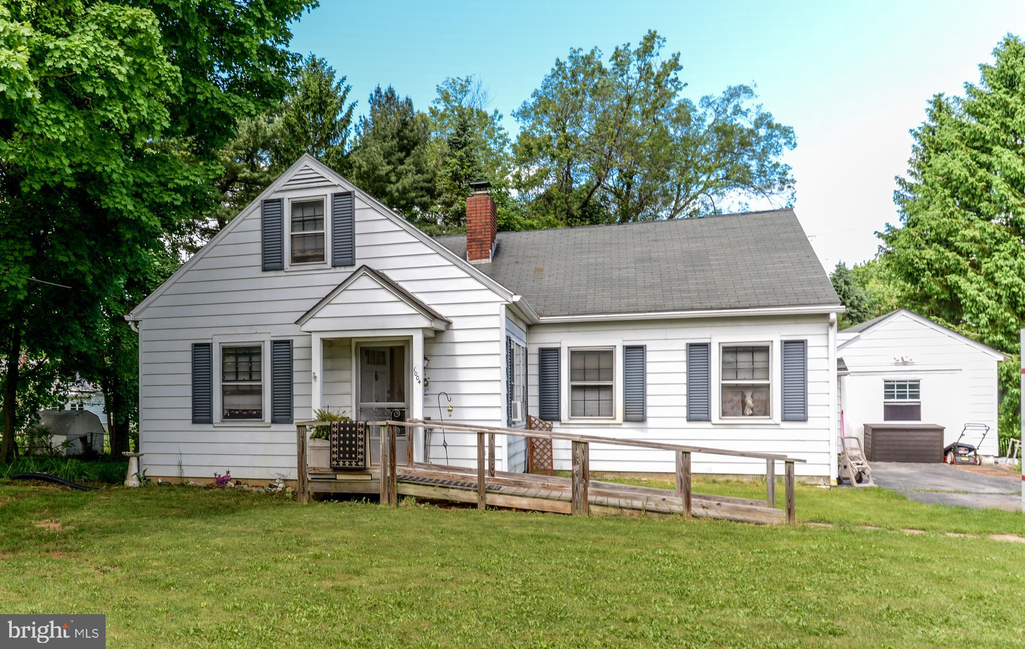 Charming cape cod home on a great lot with a nice yard. Home features 4 bedrooms with master bedroom on the first floor. Garage has been converted into additional living space. Home being sold with 1 year home warranty.