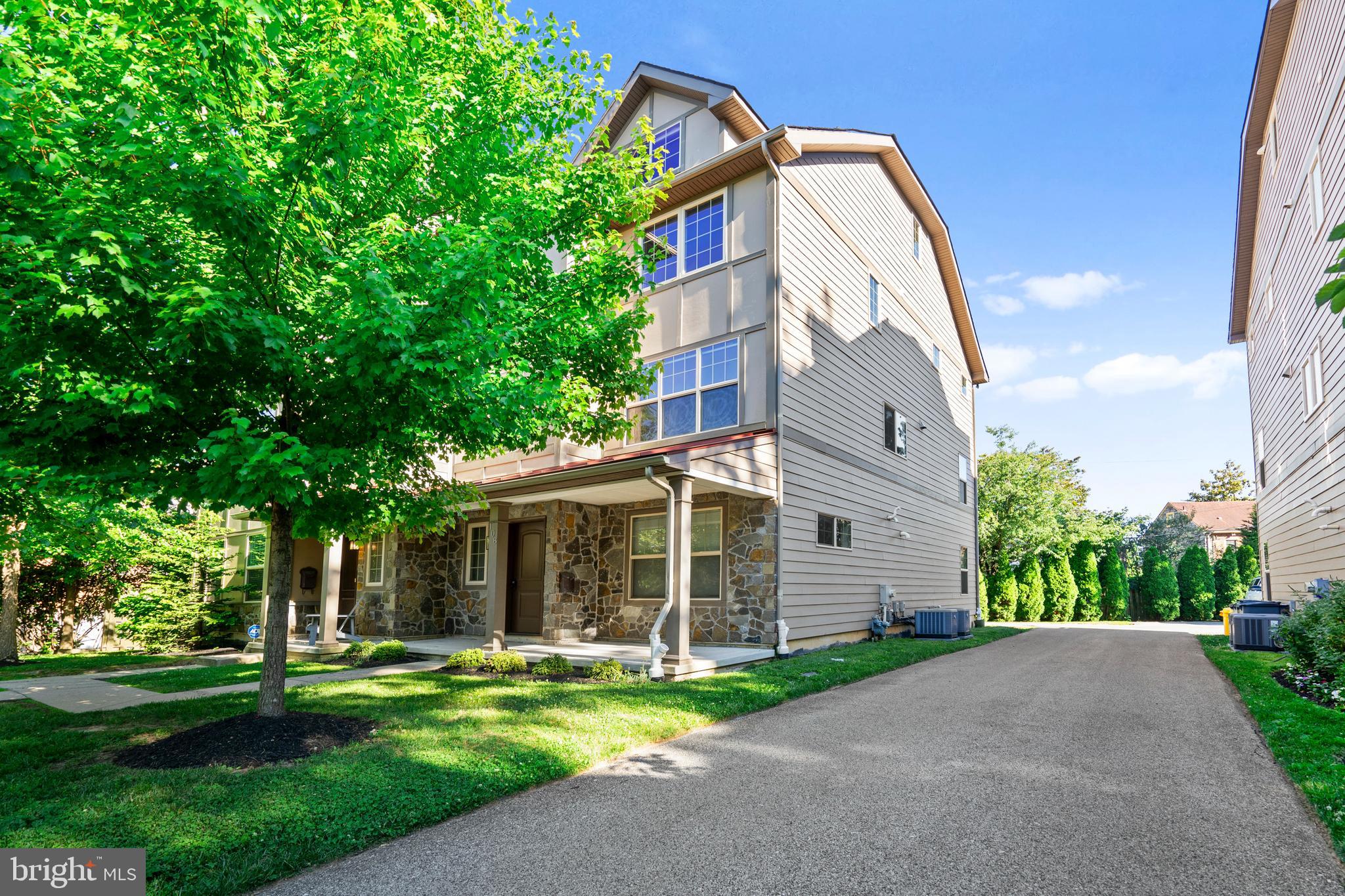 Stunning four-story luxury carriage home in the highly sought-after community of Bala Cynwyd. Combining elegant architectural design with premier modern conveniences, this property is perfect for those who appreciate premium quality, exceptional walkability, and an effortless Main Line lifestyle.

Cross the covered front porch and step into the welcoming ground-floor foyer, where you are greeted by rich hardwood flooring and a custom built-in mudroom drop zone complete with storage cubbies and coat hooks. This lower level also features a deep storage closet, a mechanical room, and direct interior access to the clean, attached garage. The garage provides excellent shelf storage and comes equipped with an outdoor EV charging outlet, making it completely ready for your electric vehicle.

Head up the stairs to the second floor to find the heart of the home, a magnificent open-concept living space flooded with natural light and anchored by gorgeous hardwood floors. The gourmet chef's kitchen is a showstopper, boasting high-end GE Cafe Series appliances, white cabinetry, a custom tile backsplash, and a massive center island with stunning granite countertops that is perfect for casual dining. The adjacent dining area flows seamlessly into a bright, spacious living room, centered around a premium sliding door that opens directly onto your private rear deck for seamless indoor-outdoor entertaining. A convenient powder room completes this main living level.

Continuing up to the third floor, the layout transitions into a space dedicated entirely to private comfort and exceptional convenience. This level features two spacious bedroom suites, each uniquely designed with its own private bath. The primary suite serves as a true retreat, featuring an oversized bedroom, an expansive walk-in closet with custom built-in shelving, and a private, spa-like en suite bath complete with a large, glass-enclosed walk-in tile shower and double vanity. The generous second bedroom functions perfectly as a guest suite or secondary primary, featuring its own private, en suite full bathroom with custom tile work and an attached walk-in closet. Completing this floor is a dedicated laundry room situated right off the bright main hallway, fully equipped with modern, matching high-capacity washers and dryers alongside built-in linen shelving to make everyday chores completely effortless.

The versatile fourth level offers additional cozy, carpeted bedroom or home office spaces, excellent closet storage, and a full hallway bathroom featuring classic subway tile framing the tub. 

Beyond the front door, this home puts you in one of the most vibrant, walkable pockets of Lower Merion Township. Enjoy incredible neighborhood convenience as you are just a short walk to the Cynwyd Commuter Rail Station for a stress-free commute into Center City Philadelphia. Stroll right over to Bala Avenue’s boutique shops and local restaurants, or take a quick drive to nearby Cynwyd Commons and the upscale retail hubs along City Avenue. To top it all off, this home is located in the prestigious, nationally recognized Lower Merion School District