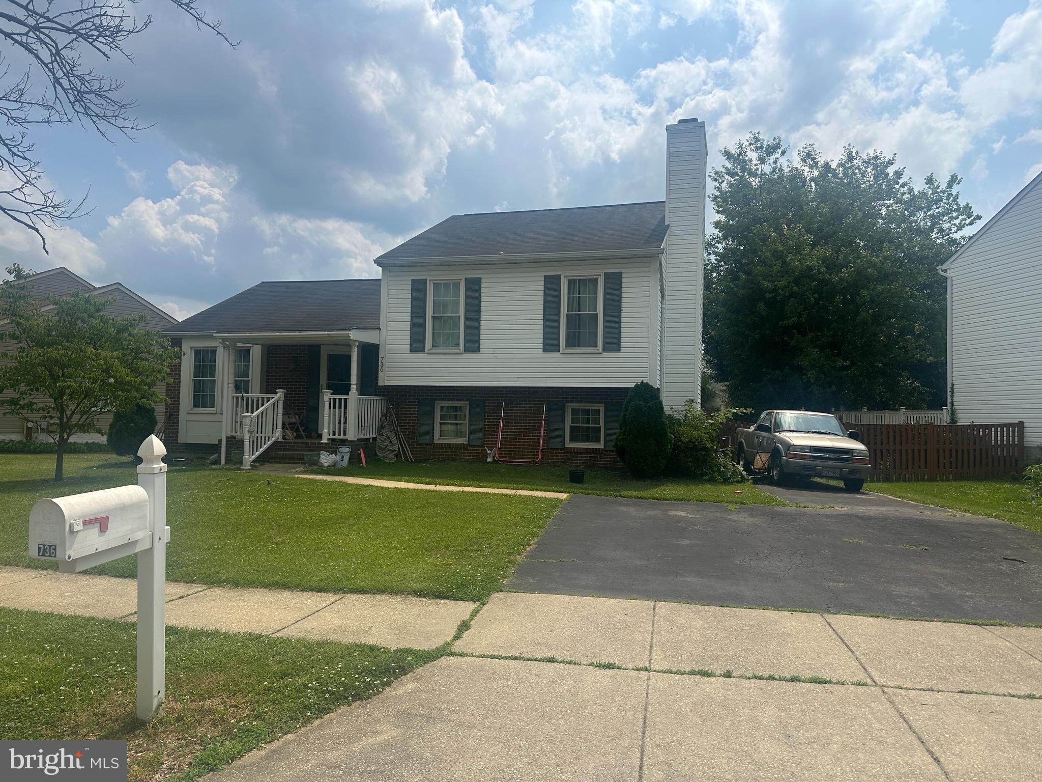 Don't miss this opportunity to build instant sweat equity in this spacious 4-level split located in desirable northern Anne Arundel County! Well below recent same model sales, Offering 3 bedrooms, 2.5 baths, and multiple finished levels, this home provides endless possibilities for customization and improvement. The main level features a living room, dining room, and kitchen with soaring cathedral ceilings, creating an open and airy feel. The lower-level family room showcases a cozy brick fireplace, while the lowest level offers several partially finished rooms ideal for a home office, hobby space, workout room, storage, or future expansion.  Outdoor amenities include a covered front porch, rear deck, fenced yard, detached 2-car garage, storage shed, ample off-street parking, and plenty of space for entertaining. Conveniently located with easy access to major commuter routes, shopping, dining, and employment centers. Home is being sold strictly as-is and is in need of cosmetic updates. Seller may require up to a 30-day rent-back after settlement. Great opportunity for investors, renovators, or home owner buyers looking to add their own personal touches.